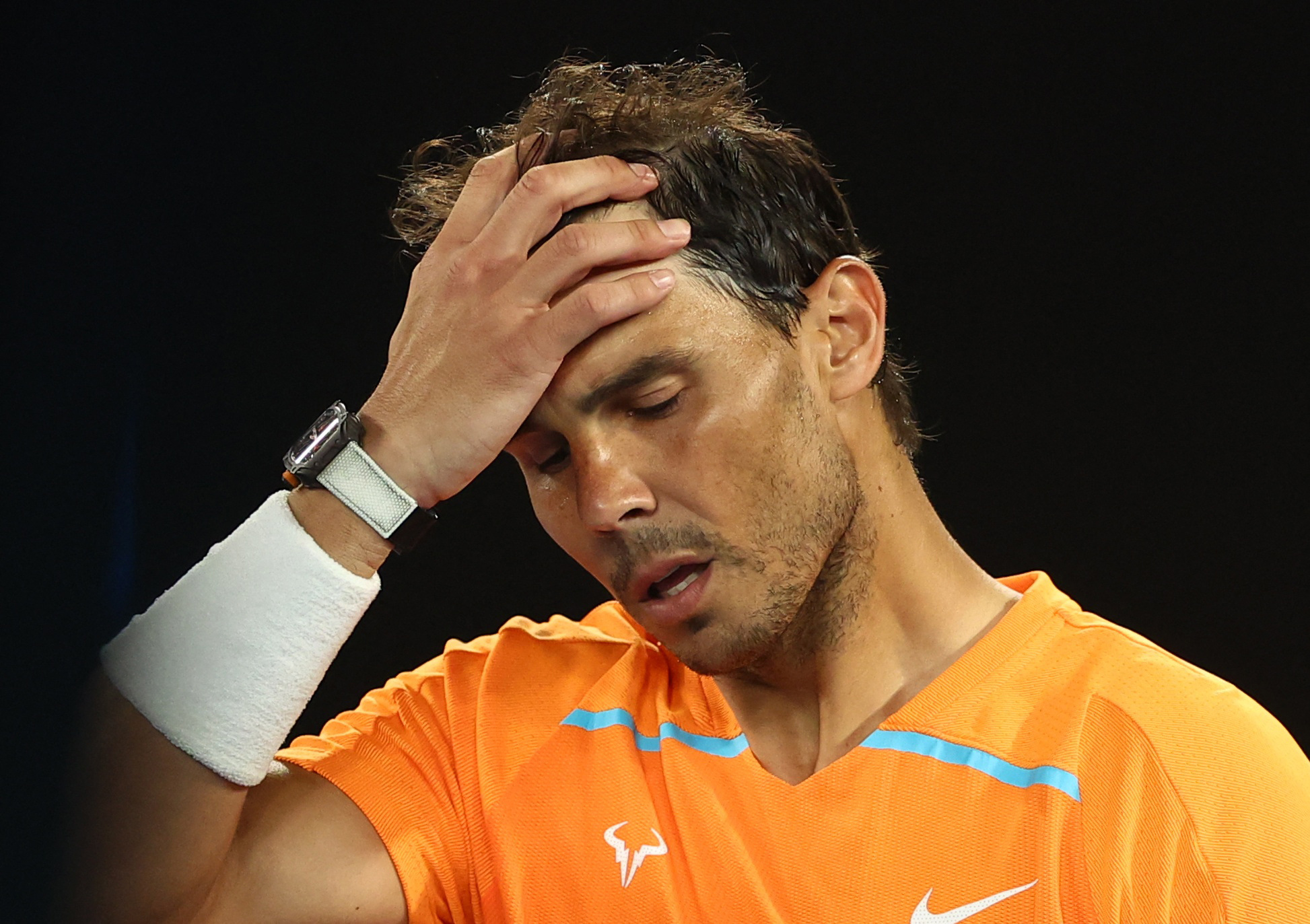 Tennis - Australian Open - Melbourne Park, Melbourne, Australia - January 18, 2023 Spain's Rafael Nadal looks dejected after losing his second round match against Mackenzie Mcdonald of the U.S. REUTERS