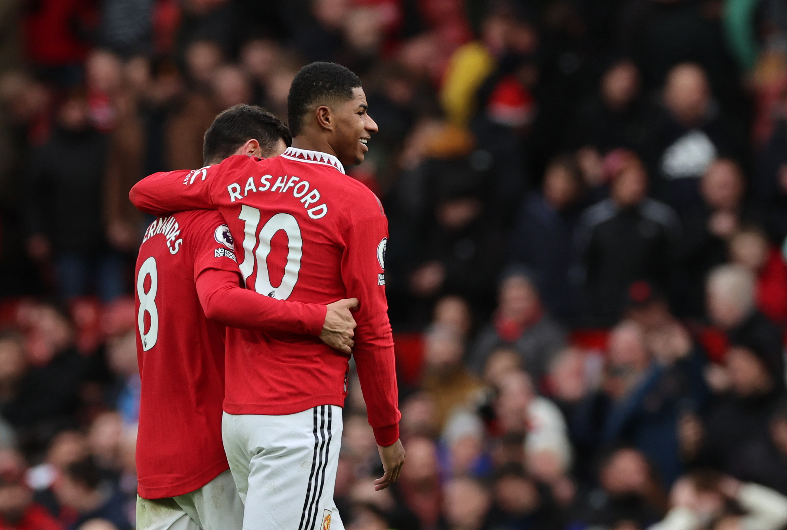 Soccer Football - Premier League - Manchester United v Manchester City - Old Trafford, Manchester, Britain - January 14, 2023 Manchester United's Bruno Fernandes and Marcus Rashford celebrate after the match REUTERS