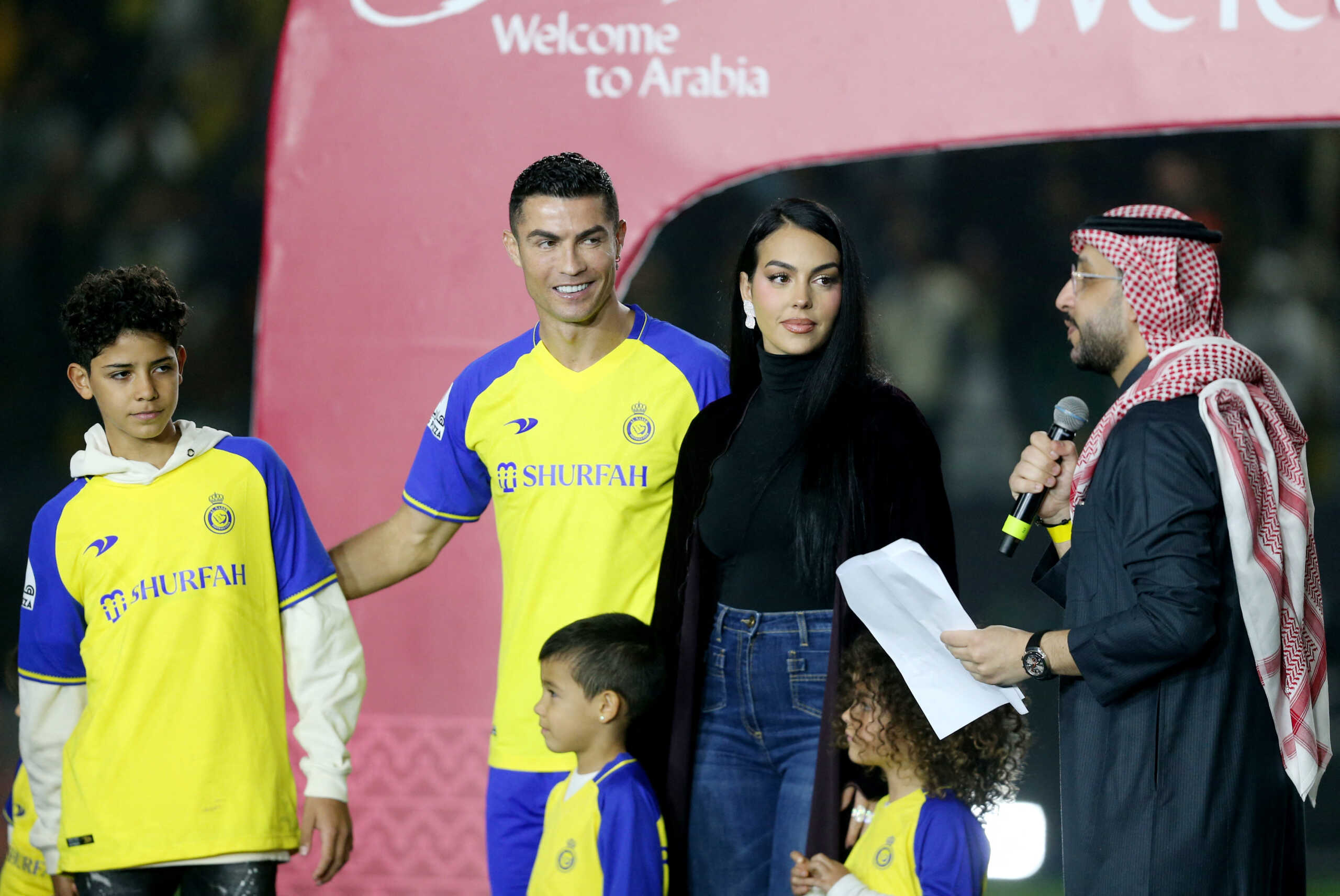 Soccer Football - Al Nassr unveil new signing Cristiano Ronaldo - Mrsool Park, Riyadh, Saudi Arabia - January 3, 2023  New Al Nassr signing Cristiano Ronaldo with his partner Georgina Rodriguez and kids during his presentation REUTERS