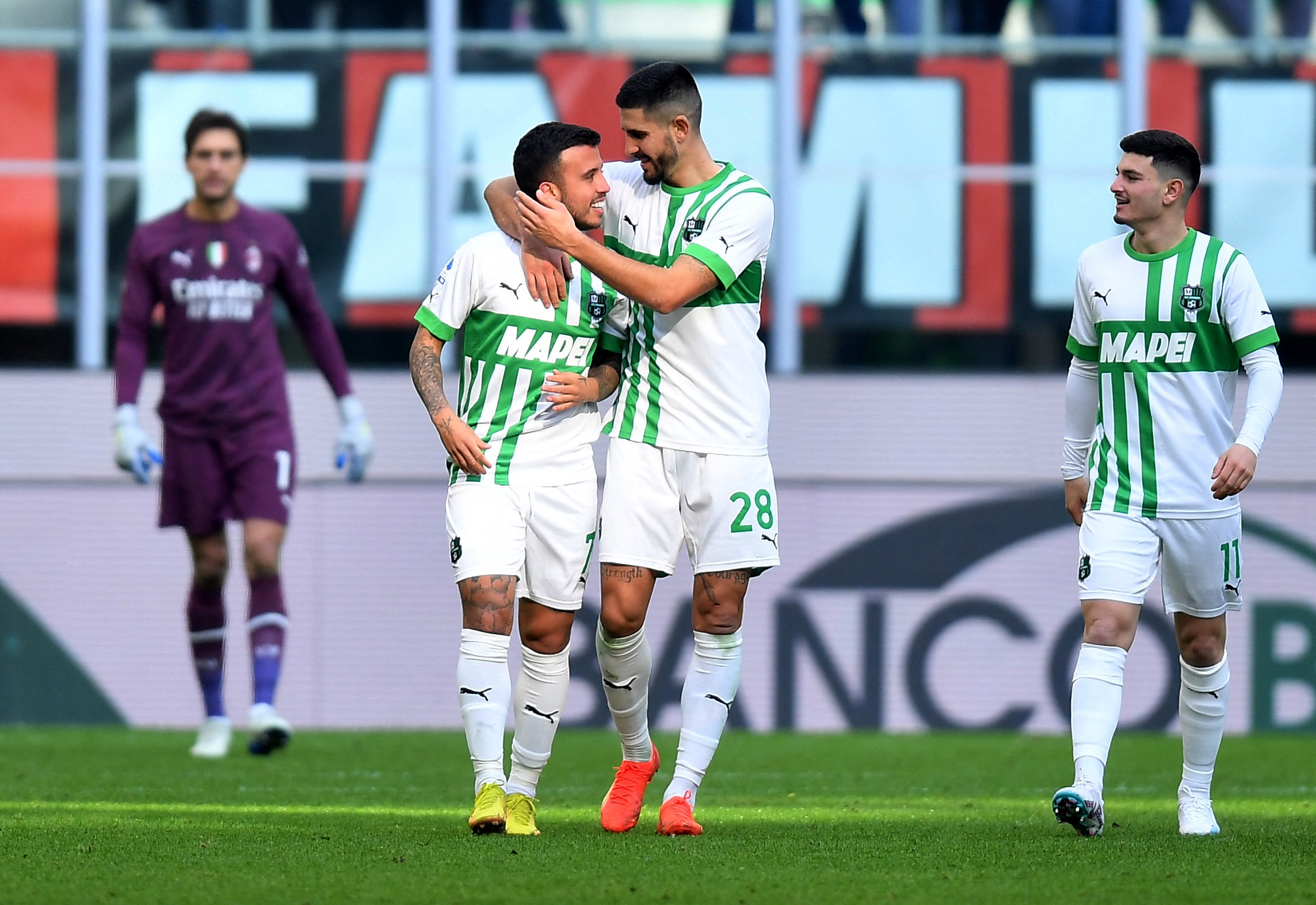 Soccer Football - Serie A - AC Milan v Sassuolo - San Siro, Milan, Italy - January 29, 2023 U.S. Sassuolo's Matheus Henrique celebrates scoring their fifth goal with Martin Erlic REUTERS