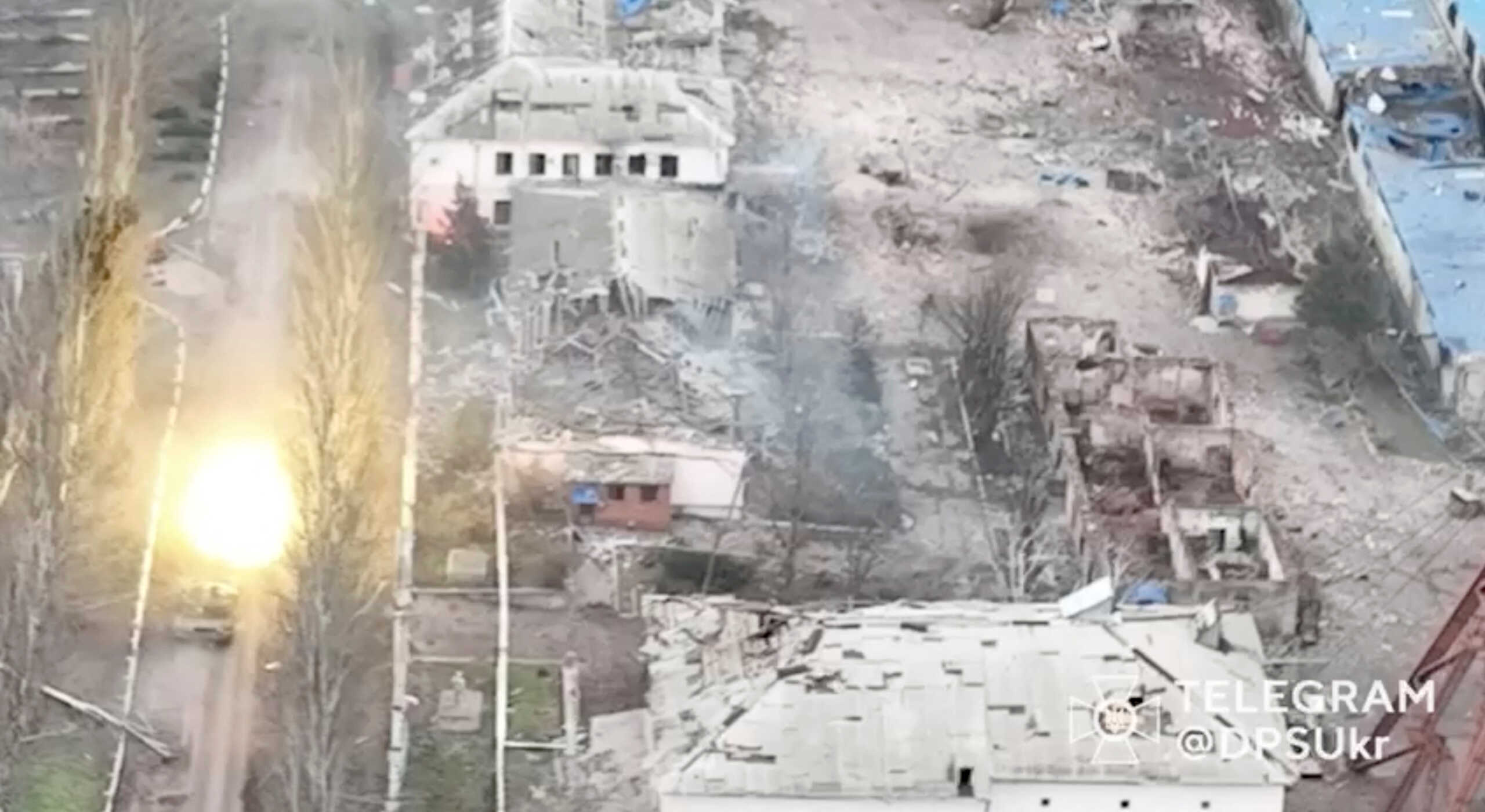 A tank fires a round, amid Russia's attack on Ukraine, in Soledar, Donetsk region, Ukraine, in this screen grab released on January 8, 2023 and obtained from a social media video by Reuters on January 10, 2023. State Border Guard Service Of Ukraine