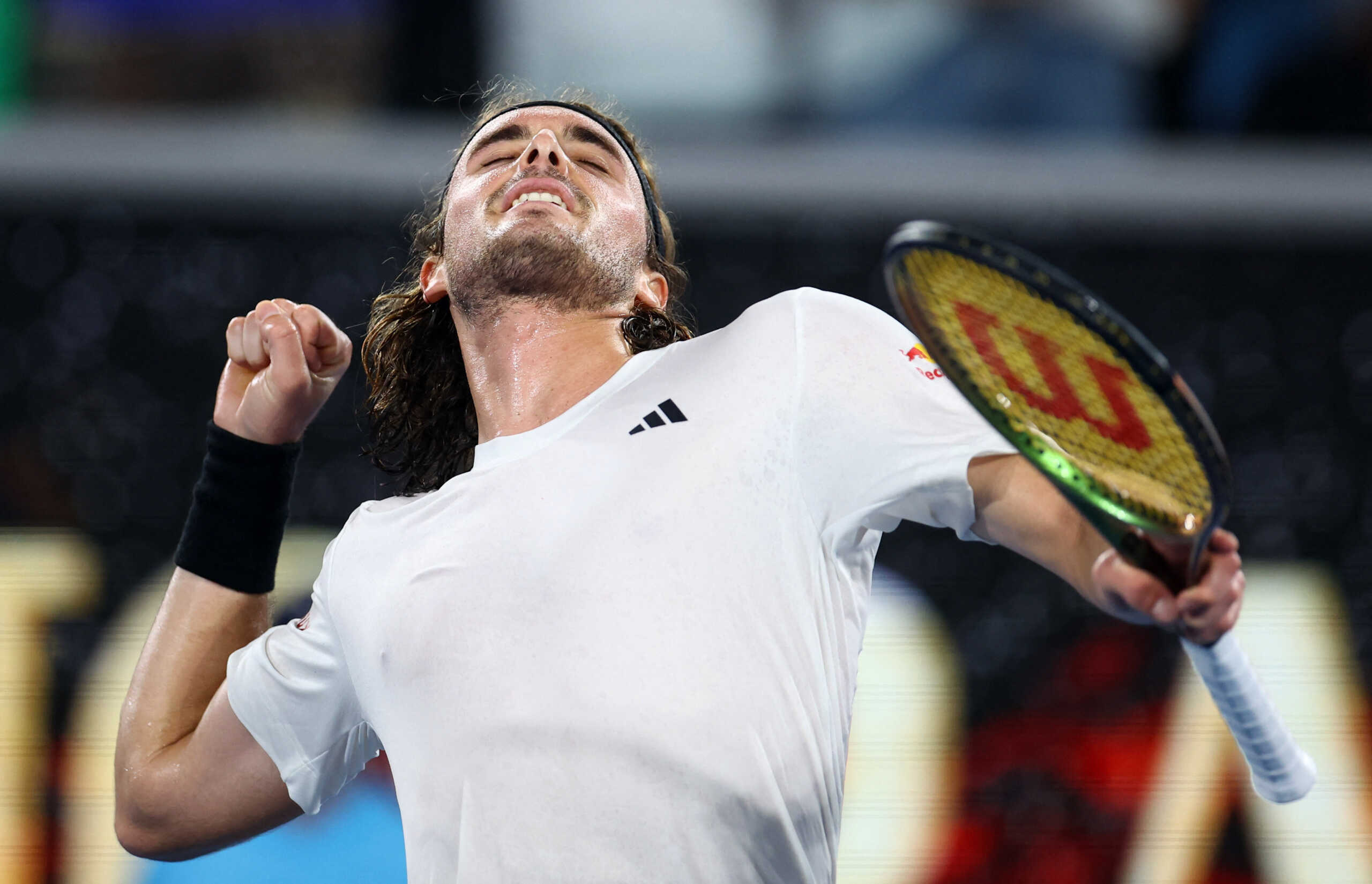 Tennis - Australian Open - Melbourne Park, Melbourne, Australia - January 16, 2023 Greece's Stefanos Tsitsipas celebrates winning his first round match against France's Quentin Halys REUTERS