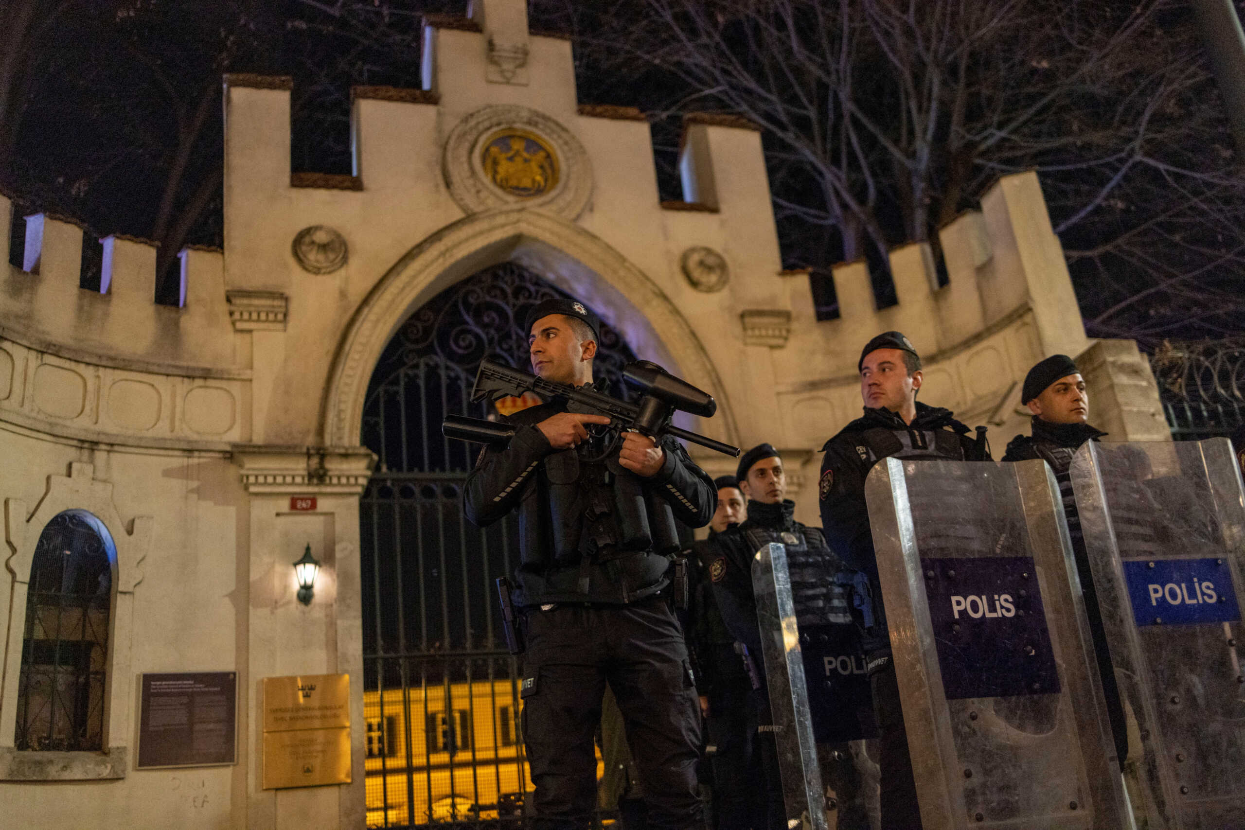 Riot police officers secure the entrance of the Consulate General of Sweden during a demonstration, after Rasmus Paludan, leader of Danish far-right political party Hard Line and who also has Swedish citizenship burned a copy of the Koran near the Turkish Embassy in Stockholm, in Istanbul, Turkey, January 21, 2023. REUTERS