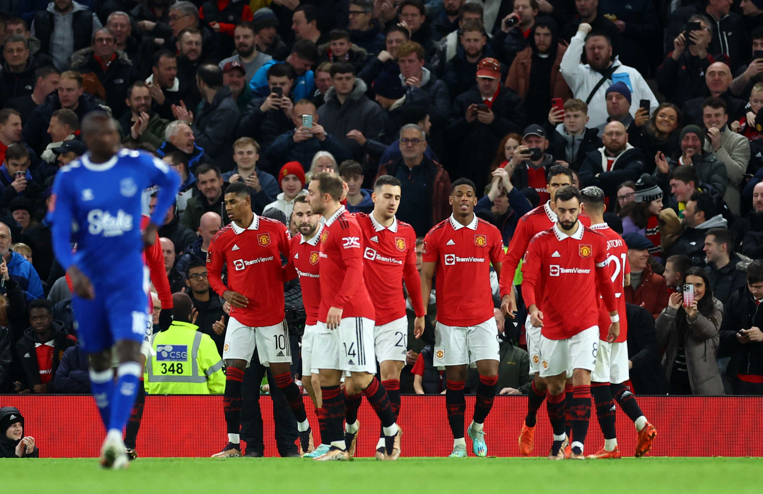 Soccer Football - FA Cup Third Round - Manchester United v Everton - Old Trafford, Manchester, Britain - January 6, 2023 Manchester United's Marcus Rashford celebrates their second goal with Luke Shaw, Christian Eriksen and teammates REUTERS