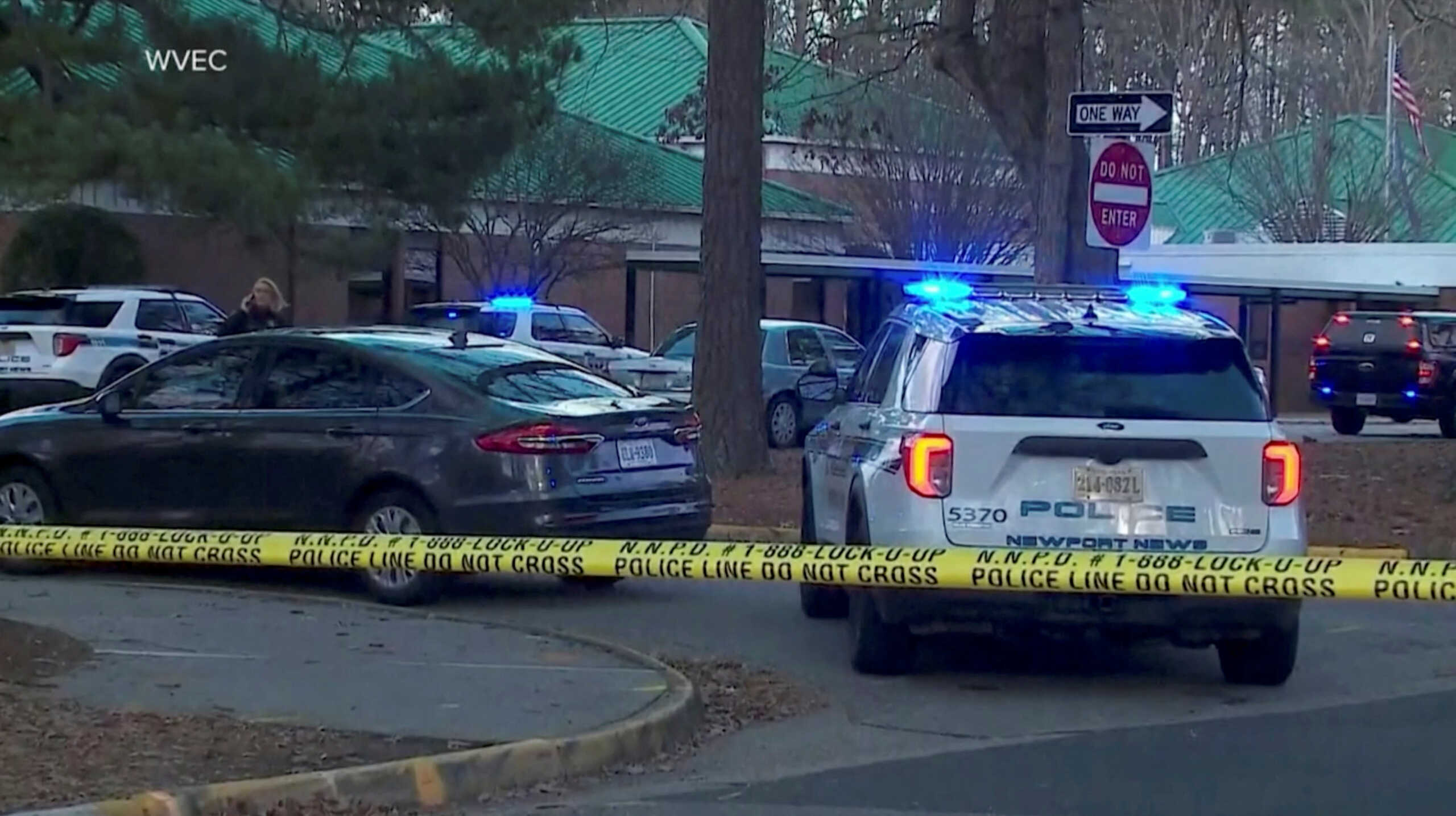 Police vehicles are seen parked outside Richneck Elementary School, where according to the police, a six-year-old boy shot and wounded a teacher, in Newport News, Virginia, U.S., January 6, 2023, in this screen grab from a handout video. WVEC via ABC