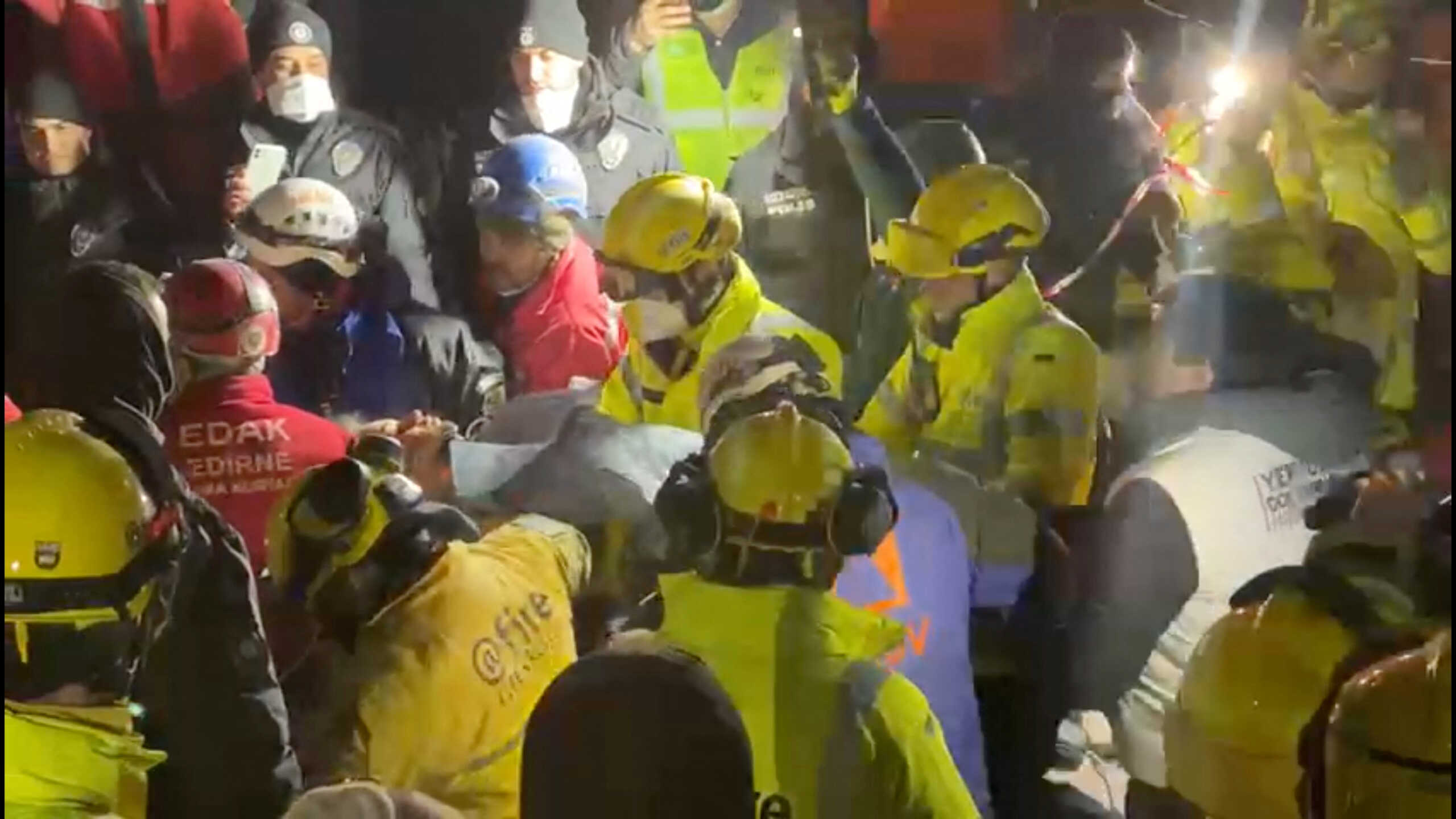 Rescue workers rescue a 15-year-old girl who was trapped under the rubble, in the aftermath of a deadly earthquake in Kahramanmaras, Turkey February 10, 2023, in this screen grab obtained from a handout video. @fire - Internationaler Katastrophenschutz