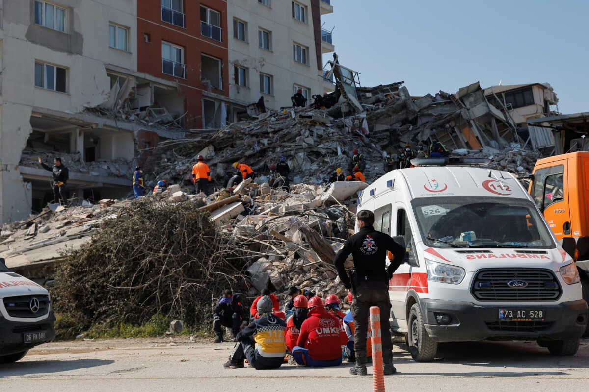 Rescuers work at the site of a collapsed building, in the aftermath of the deadly earthquake, in Antakya, Turkey February 18, 2023. REUTERS