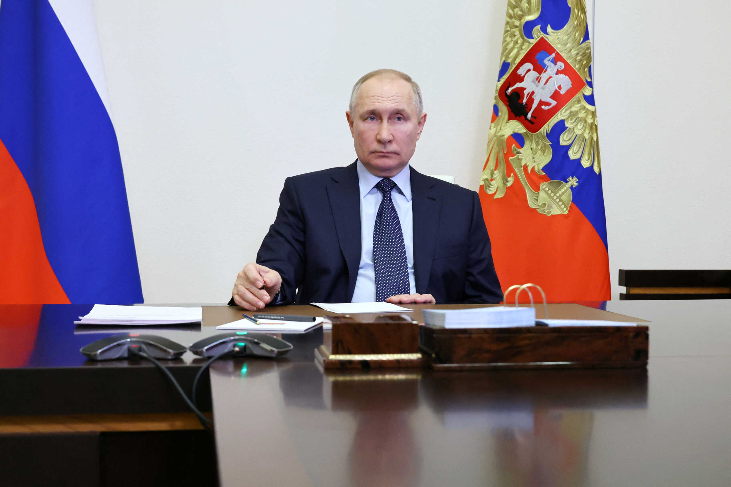 Russian President Vladimir Putin chairs a meeting on the restoration of destroyed housing and infrastructure in regions of southwest Russia that border Ukraine, via a video conference at the Novo-Ogaryovo state residence outside Moscow, Russia February 1, 2023. Sputnik