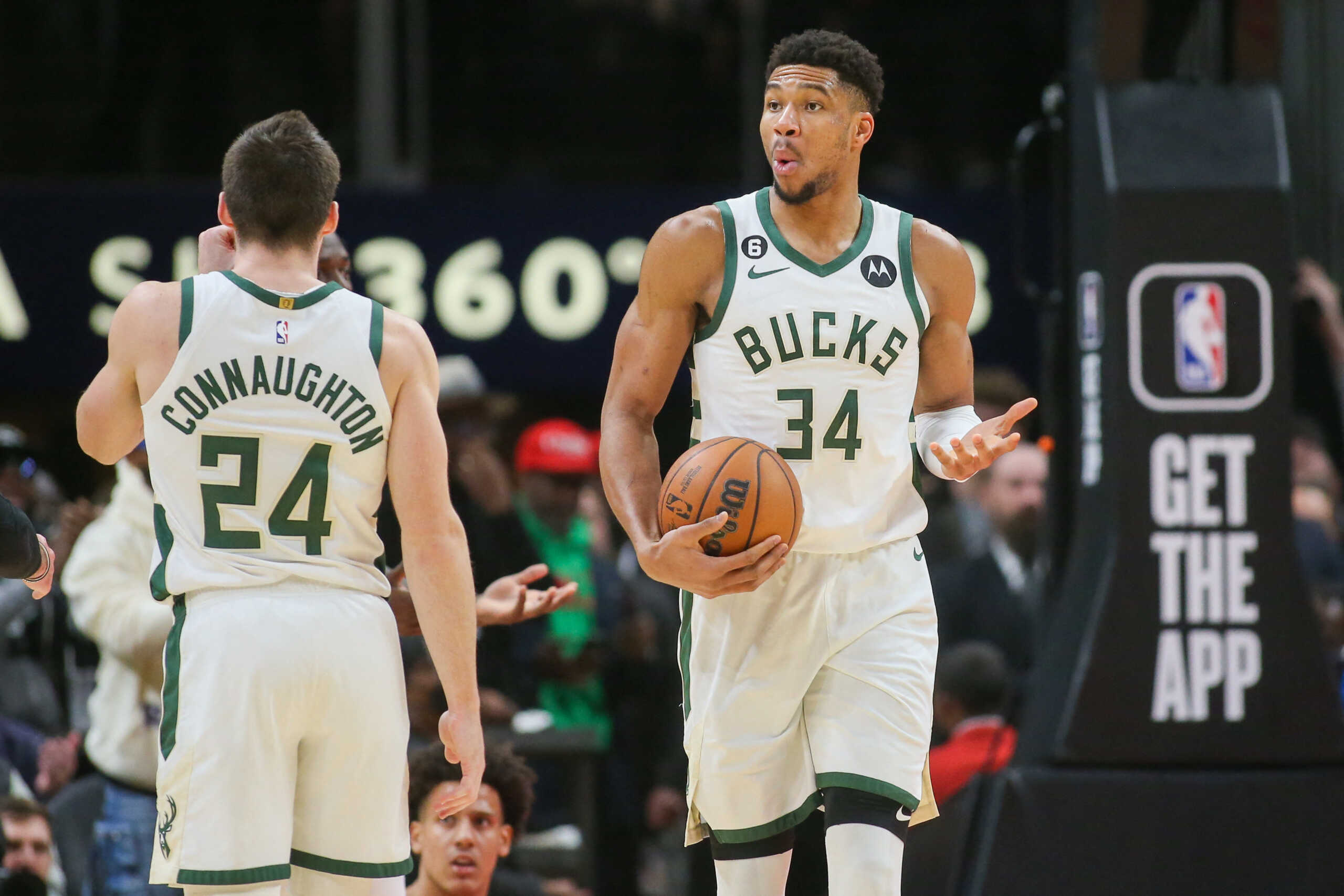 Jan 11, 2023; Atlanta, Georgia, USA; Milwaukee Bucks forward Giannis Antetokounmpo (34) reacts after being called for a foul against the Atlanta Hawks in the second half at State Farm Arena. Mandatory Credit: Brett Davis-USA TODAY Sports