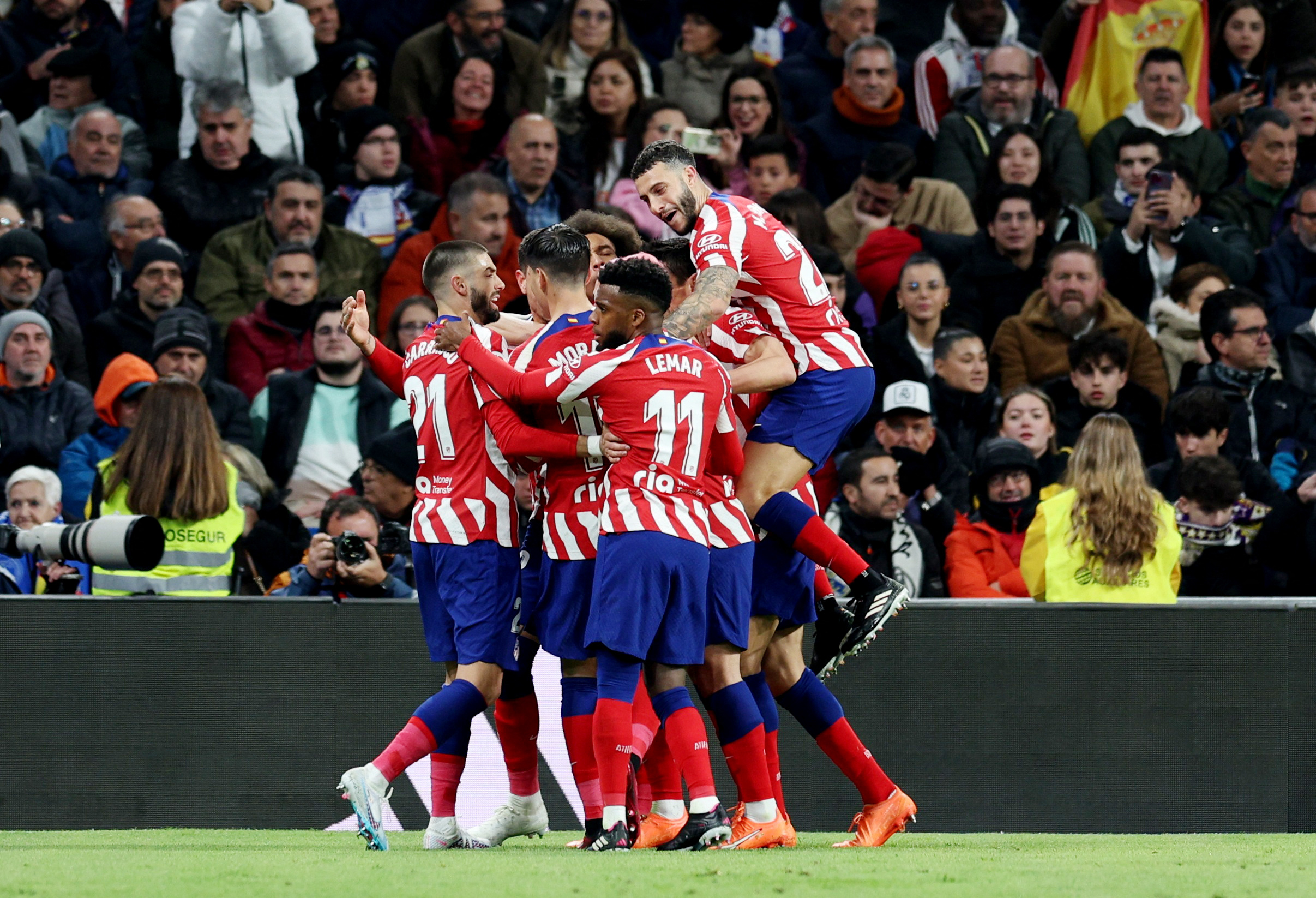 Soccer Football - LaLiga - Real Madrid v Atletico Madrid - Santiago Bernabeu, Madrid, Spain - February 25, 2023 Atletico Madrid's Jose Gimenez celebrates scoring their first goal with teammates REUTERS