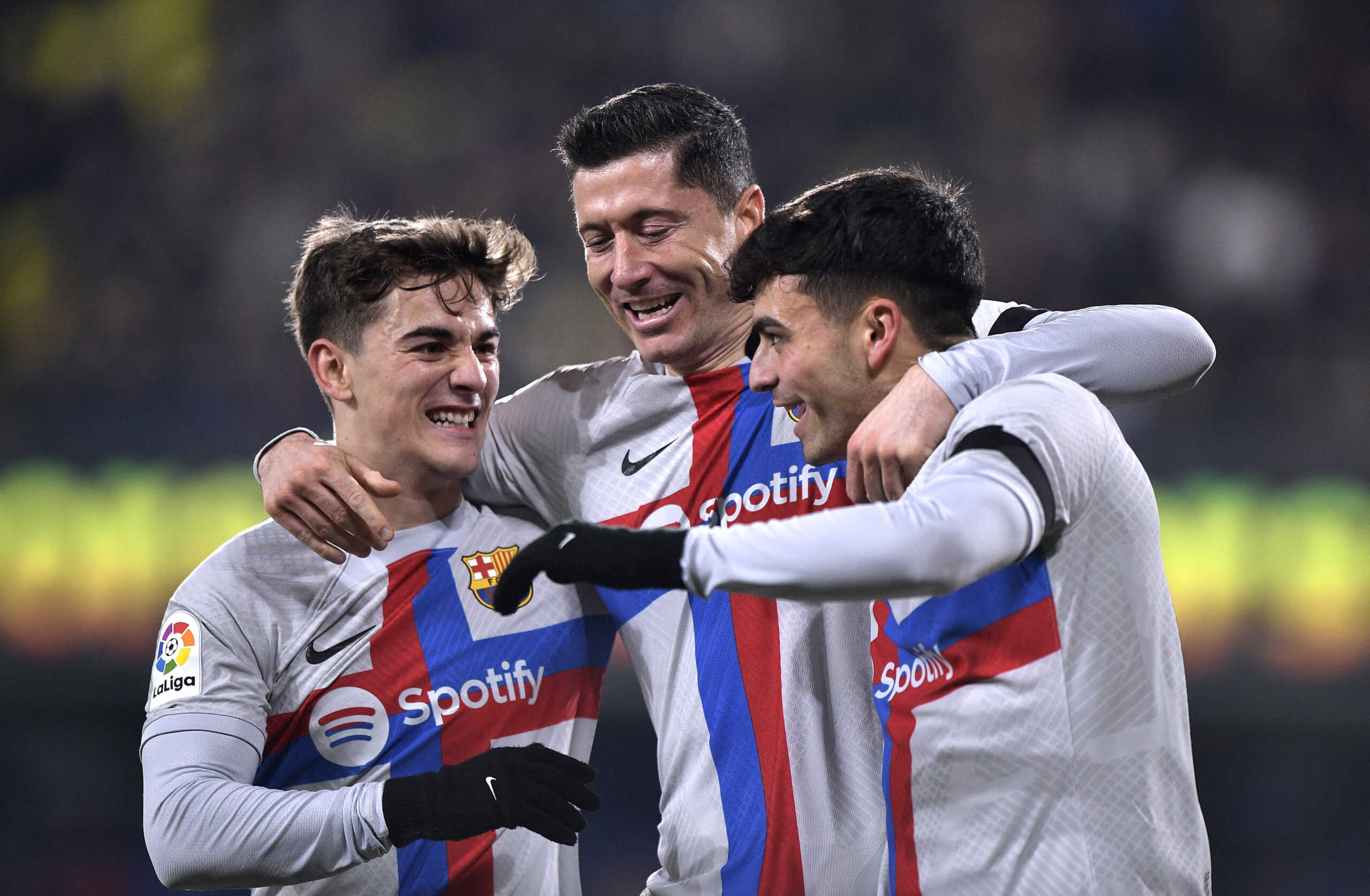 Soccer Football - LaLiga - Villarreal v FC Barcelona - Estadio de la Ceramica, Villarreal, Spain - February 12, 2023 FC Barcelona's Pedri celebrates scoring their first goal with Robert Lewandowski and Gavi REUTERS