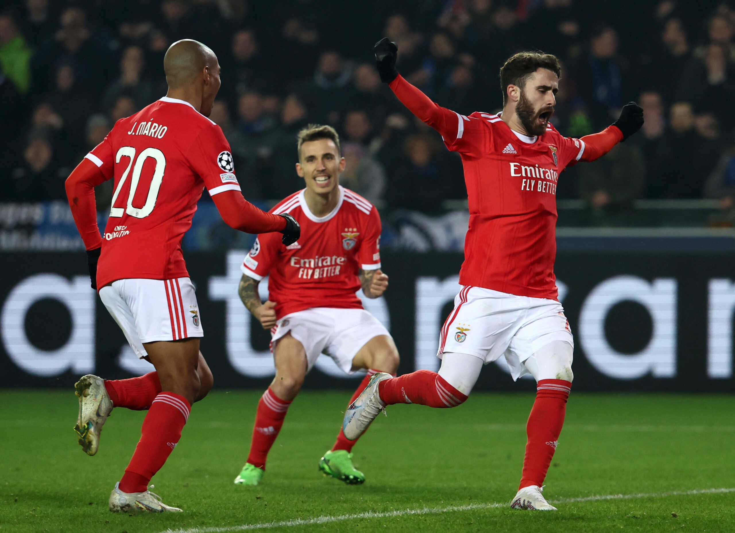 Soccer Football - Champions League - Round of 16 First Leg - Club Brugge v Benfica - Jan Breydel Stadium, Bruges, Belgium - February 15, 2023 Benfica's Joao Mario celebrates scoring their first goal with Rafa Silva REUTERS