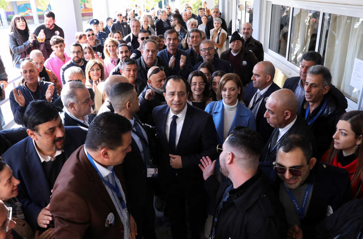 Presidential candidate Nikos Christodoulides meets with supporters outside a polling station during the second round of the presidential election in Geroskipou near Paphos, Cyprus, February 12, 2023. REUTERS