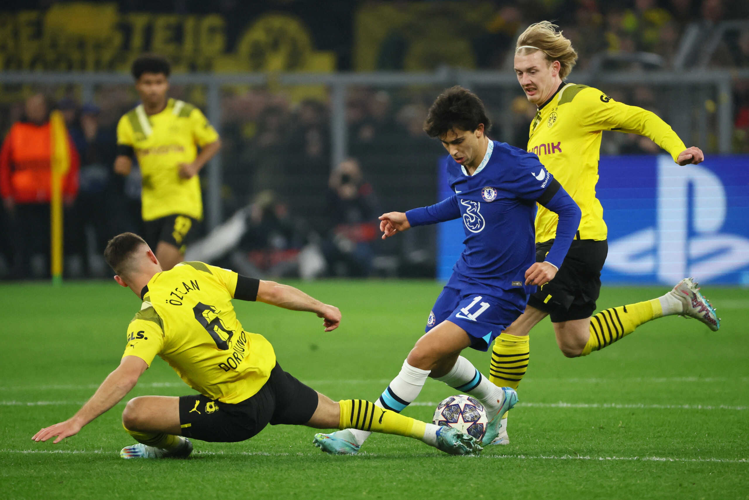 Soccer Football - Champions League - Round of 16 First Leg - Borussia Dortmund v Chelsea - Signal Iduna Park, Dortmund, Germany - February 15, 2023  Chelsea's Joao Felix in action with Borussia Dortmund's Salih Ozcan and Julian Brandt REUTERS