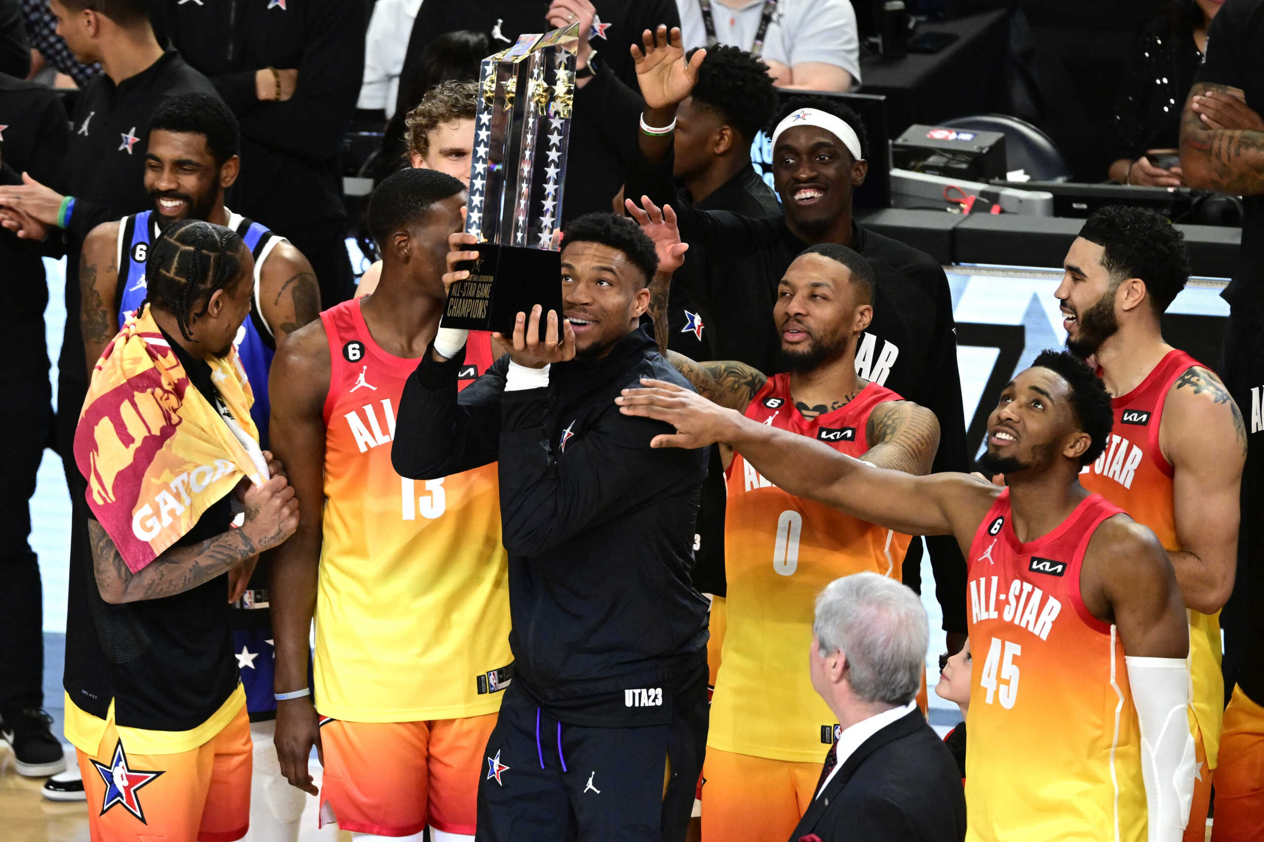 Feb 19, 2023; Salt Lake City, UT, USA; Team Giannis forward Giannis Antetokounmpo (34) holds up the NBA All-Star Game Trophy after the 2023 NBA All-Star Game at Vivint Arena. Mandatory Credit: Christopher Creveling-USA TODAY Sports