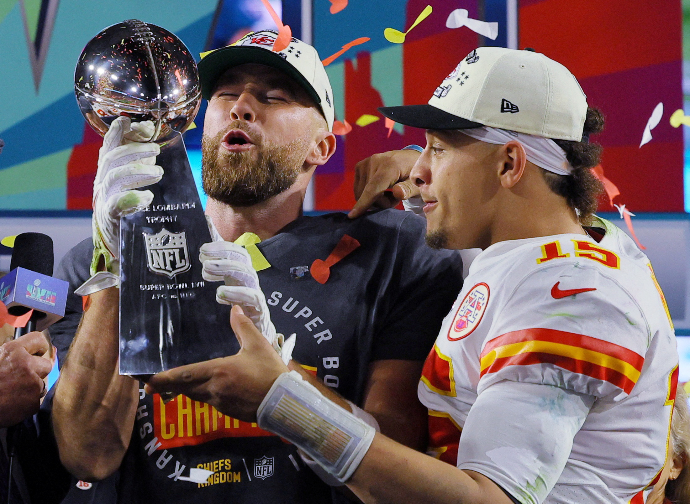 Football - NFL - Super Bowl LVII - Kansas City Chiefs v Philadelphia Eagles - State Farm Stadium, Glendale, Arizona, United States - February 12, 2023 Kansas City Chiefs' Travis Kelce and Patrick Mahomes celebrate with the Vince Lombardi Trophy after winning Super Bowl LVII REUTERS