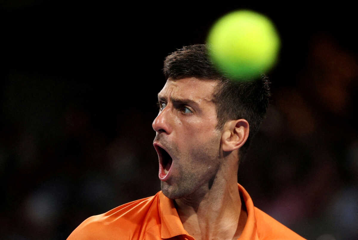 FILE PHOTO: Tennis - Adelaide International - Memorial Drive Tennis Club, Adelaide, Australia - January 8, 2023 Serbia's Novak Djokovic reacts during the final match against Sebastian Korda of the U.S. REUTERS