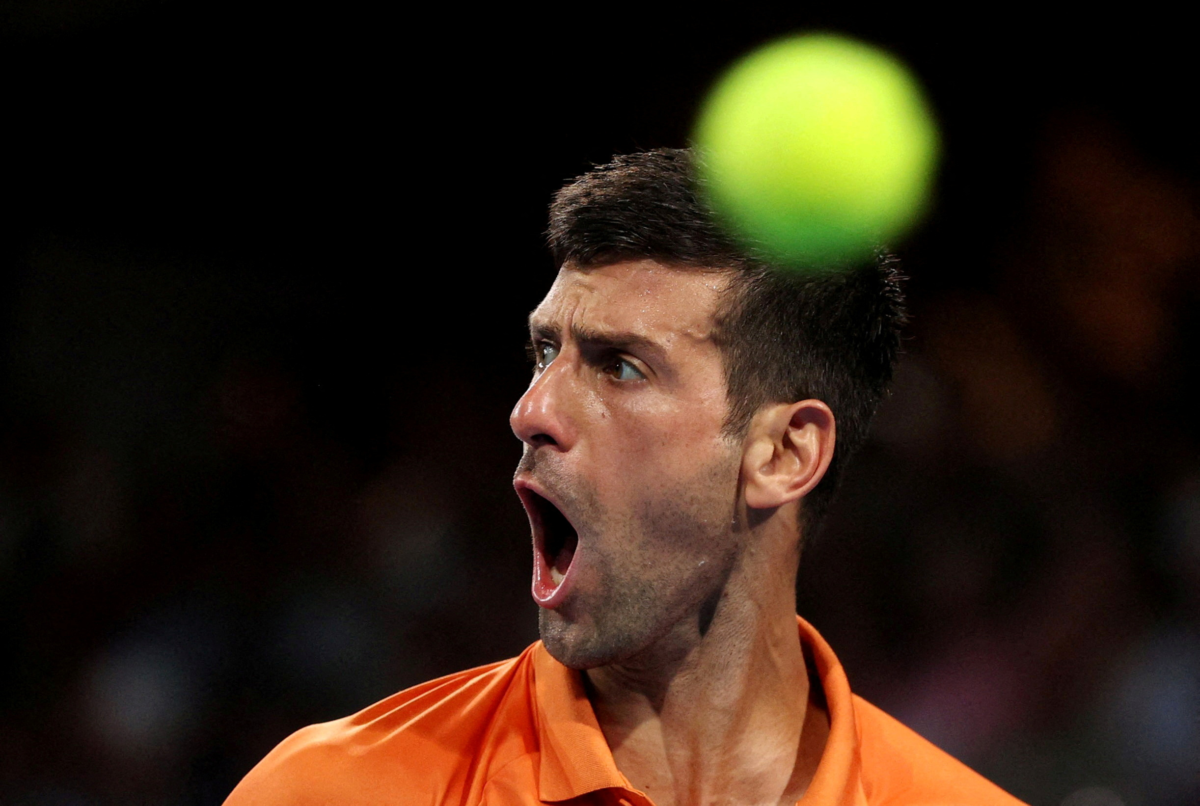 FILE PHOTO: Tennis - Adelaide International - Memorial Drive Tennis Club, Adelaide, Australia - January 8, 2023 Serbia's Novak Djokovic reacts during the final match against Sebastian Korda of the U.S. REUTERS