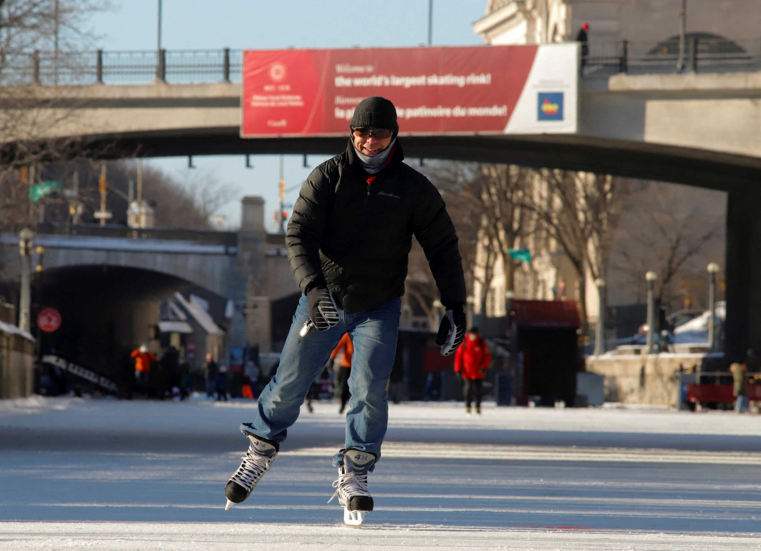 FILE PHOTO: A man skates on the Rideau Canal Skateway, the world's largest skating rink, during a period of subzero Arctic weather in Ottawa, Ontario, Canada January 14, 2022.  REUTERS