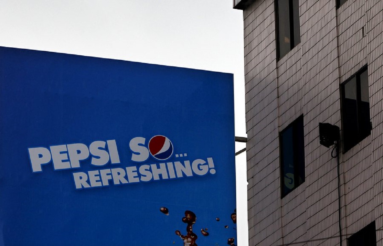 epa03354537 An advertisement billboard of Pepsi-Cola is seen beside a housing apartment in Yangon, Myanmar, 10 August 2012. PepsiCo, one of the largest drinks manufacturers in the world, has announced it will restart operations in Myanmar. Myanmar, ranked among the world's poorest countries, has only recently seen the lifting of economic sanctions imposed by Western democracies in the aftermath of the army's crackdown on a pro-democracy movement in 1988, which left an estimated 3,000 people dead. The US and European Union this year partially lifted their sanctions on Myanmar in response to political and economic reforms pushed through by President Thein Sein. Myanmar has been under nominal civilian rule since the November 2010 elections ended the rule of the military junta, which came to power in 1988.  EPA