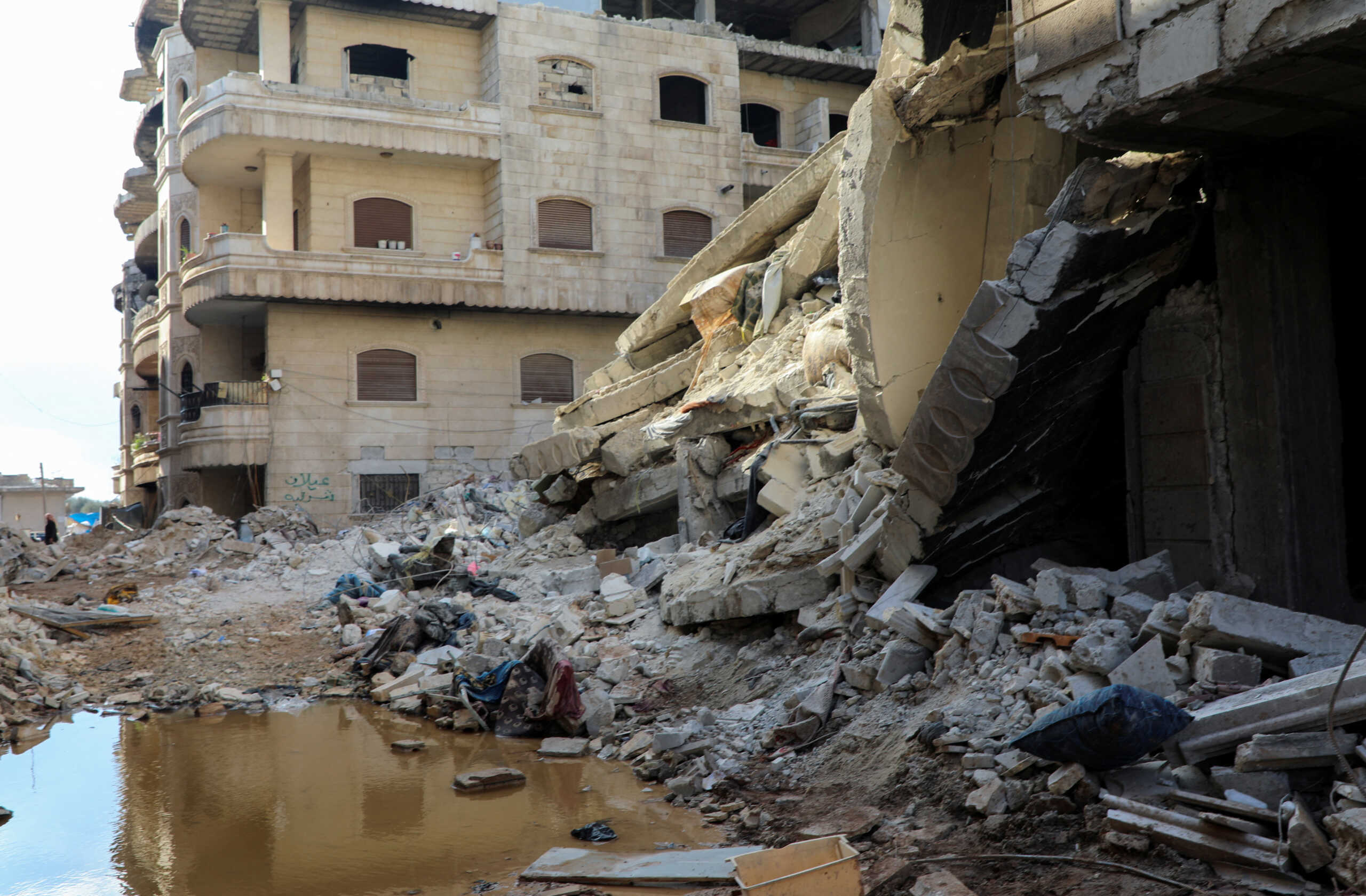 Rubble of damaged buildings near the home of earthquake survivor, Ahmed Hajj Hussein, in the aftermath of a deadly earthquake, in rebel-held town of Jandaris, Syria February 11, 2023. REUTERS