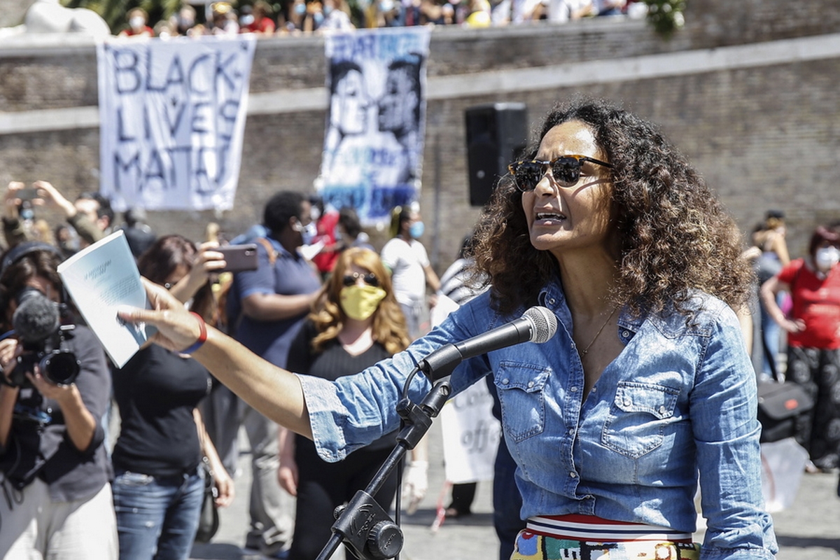 epa08470975 Stella Jean, a young Italian-Haitian designer born in Rome, attends the demonstration in memory of George Floyd in Piazza del Popolo, Rome, Italy, 07 June 2020. The protesters gather to demonstrate in the wake of the death in police custody of George Floyd in the United States.  EPA