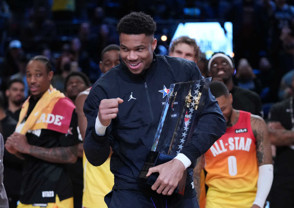 Feb 19, 2023; Salt Lake City, UT, USA; Team Giannis forward Giannis Antetokounmpo (34) celebrates with the NBA All-Star Game Trophy after the 2023 NBA All-Star Game at Vivint Arena. Mandatory Credit: Kyle Terada-USA TODAY Sports