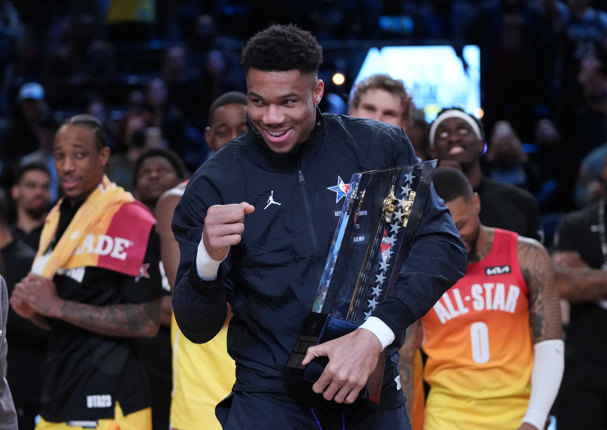 Feb 19, 2023; Salt Lake City, UT, USA; Team Giannis forward Giannis Antetokounmpo (34) celebrates with the NBA All-Star Game Trophy after the 2023 NBA All-Star Game at Vivint Arena. Mandatory Credit: Kyle Terada-USA TODAY Sports