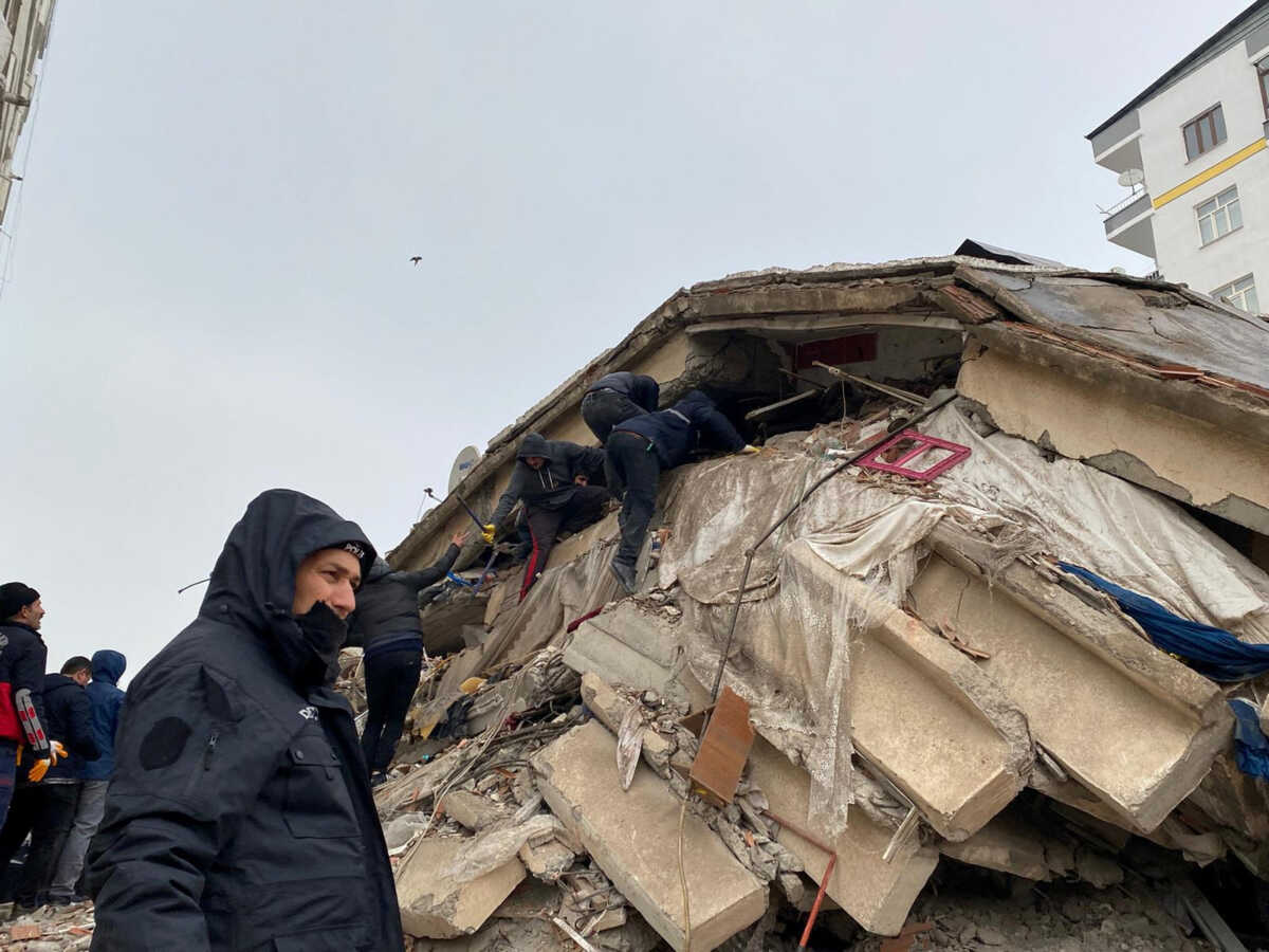 People search through rubble following an earthquake in Diyarbakir, Turkey February 6, 2023. REUTERS
