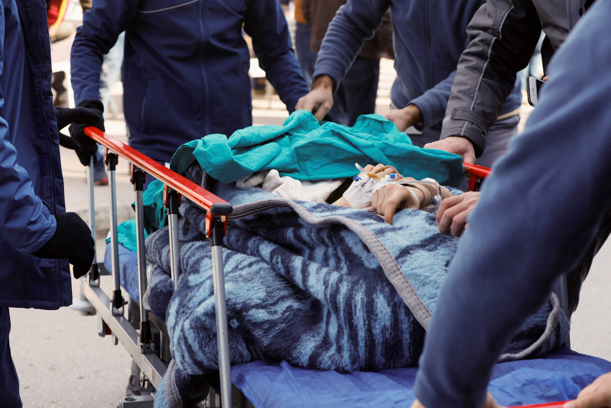 Medics bring in an injured person coming from Hatay, to an emergency unit of Adana Sehir Hastanesi hospital in Adana, Turkey February 8, 2023. REUTERS
