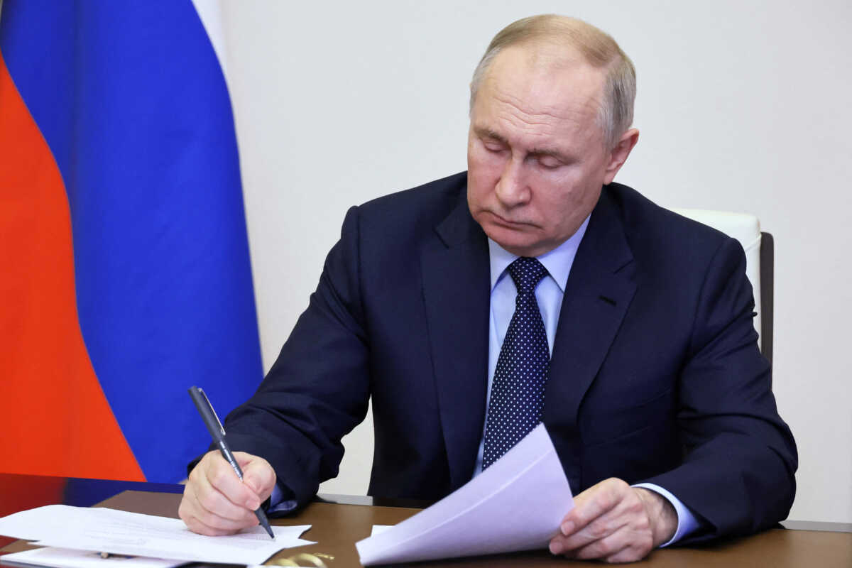 Russian President Vladimir Putin chairs a meeting on the restoration of destroyed housing and infrastructure in regions of southwest Russia that border Ukraine, via a video conference at the Novo-Ogaryovo state residence outside Moscow, Russia February 1, 2023. Sputnik