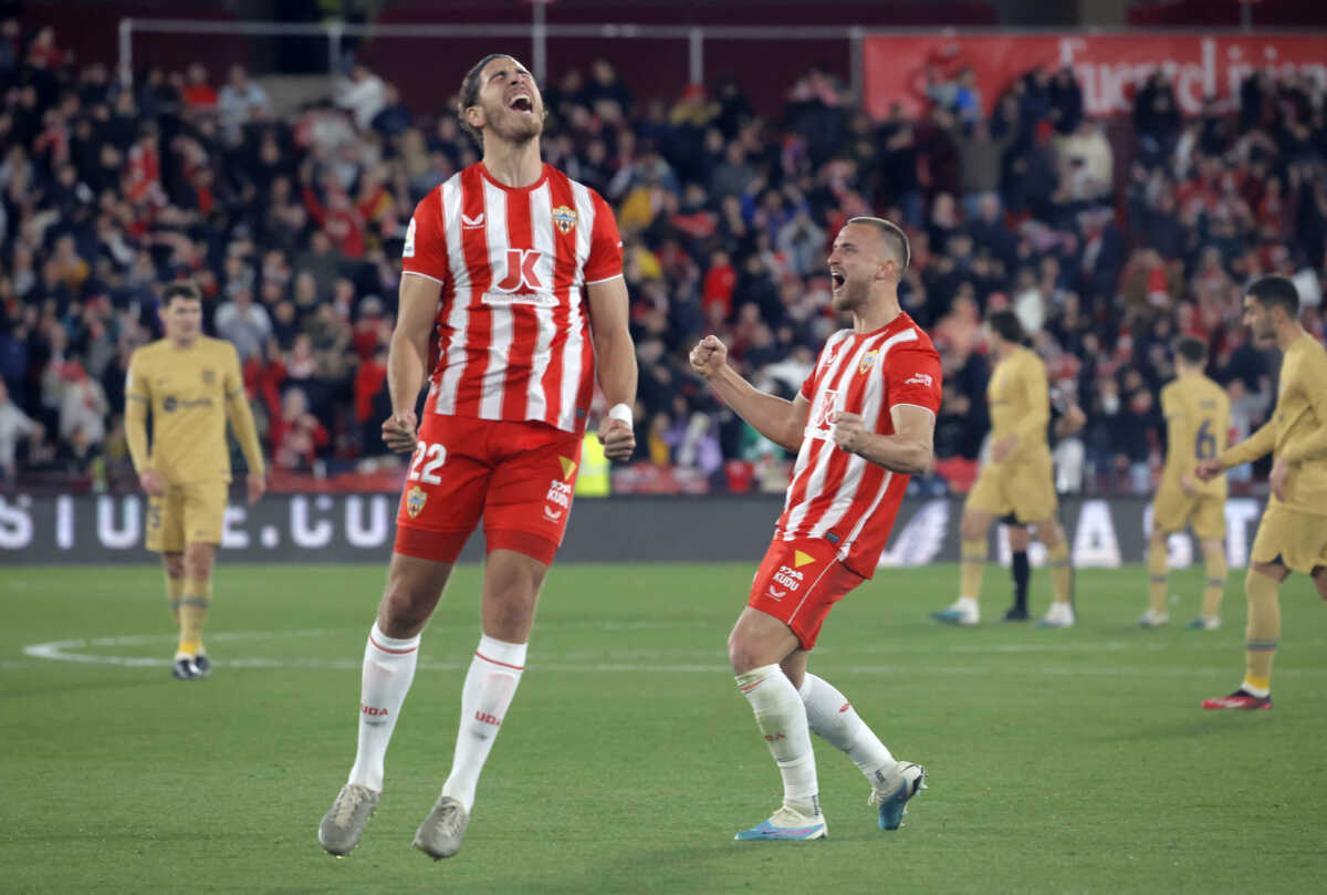Soccer Football - LaLiga - Almeria v FC Barcelona - Estadio de los Juegos Mediterraneos, Almeria, Spain - February 26, 2023  Almeria's Srdan Babic and Rodrigo Ely celebrate after the match REUTERS