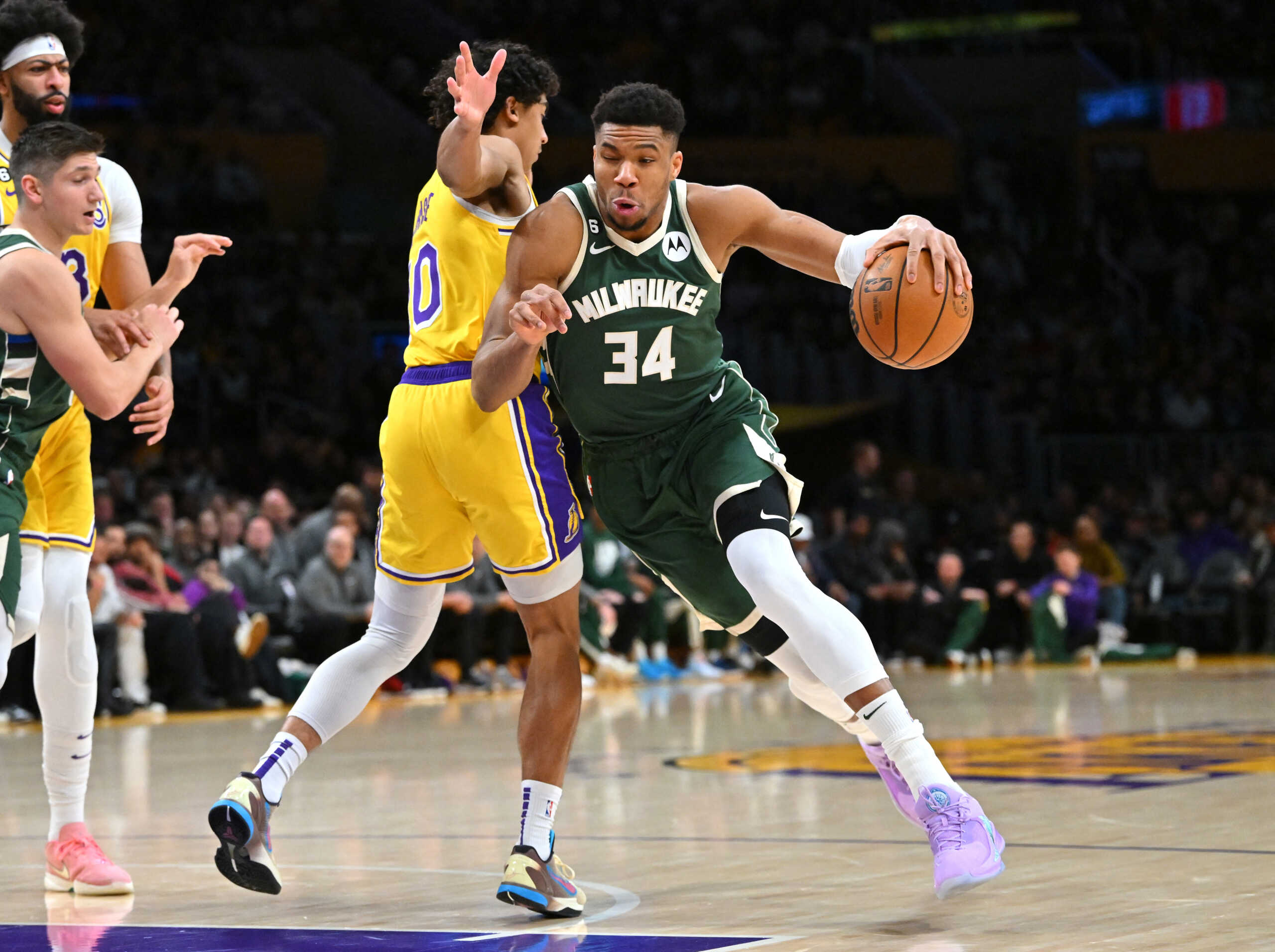Feb 9, 2023; Los Angeles, California, USA;  Milwaukee Bucks forward Giannis Antetokounmpo (34) drives past Los Angeles Lakers guard Max Christie (10) in the first quarter at Crypto.com Arena. Mandatory Credit: Jayne Kamin-Oncea-USA TODAY Sports