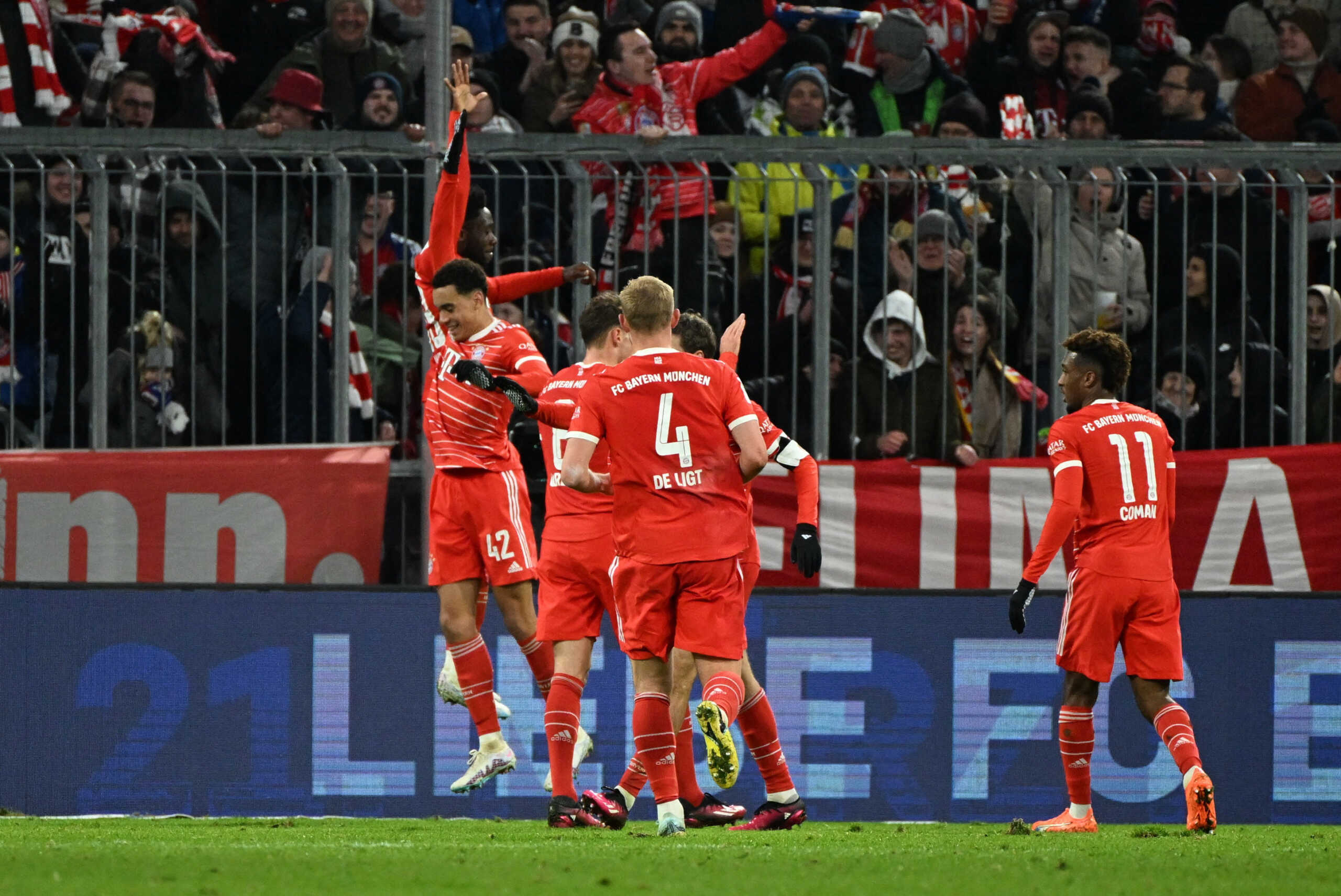 Soccer Football - Bundesliga - Bayern Munich v 1. FC Union Berlin - Allianz Arena, Munich, Germany - February 26, 2023 Bayern Munich's Jamal Musiala celebrates scoring their third goal with teammates REUTERS