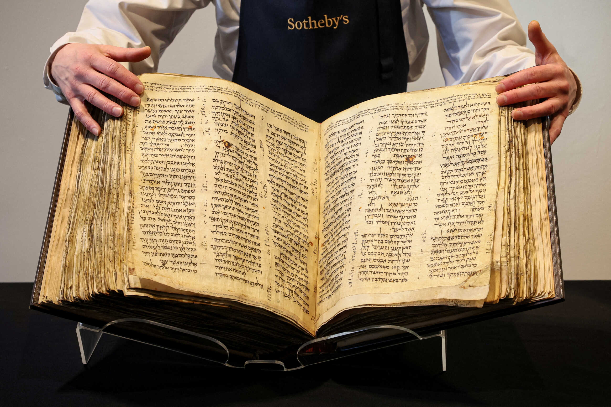 The Codex Sassoon, the earliest and most complete Hebrew Bible ever discovered which is estimated to sell for between $30 million and $50 million, is displayed at Sotheby's in New York City, New York, U.S., February 15, 2023. REUTERS