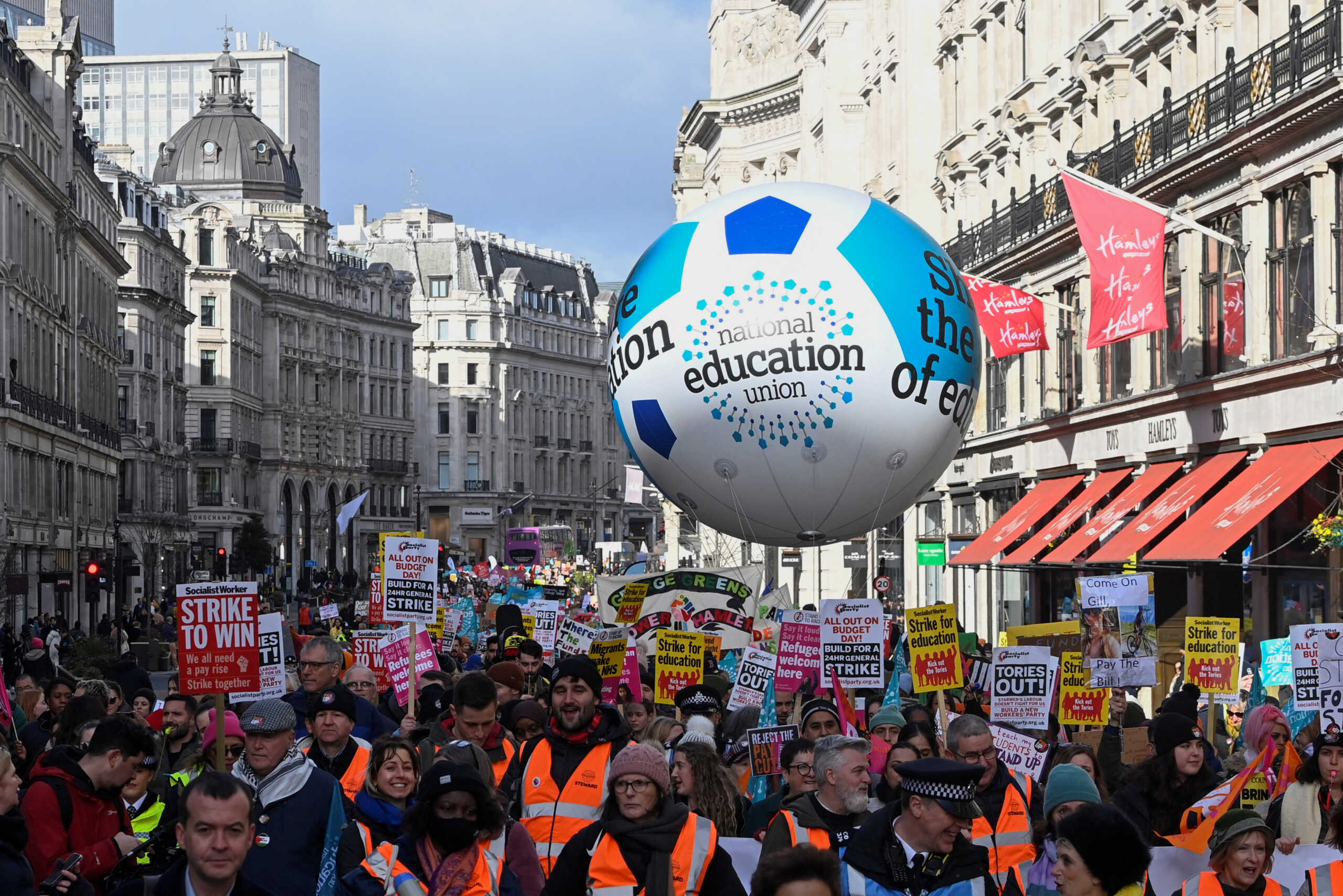 Striking workers attend a march, in London, Britain February 1, 2023. REUTERS