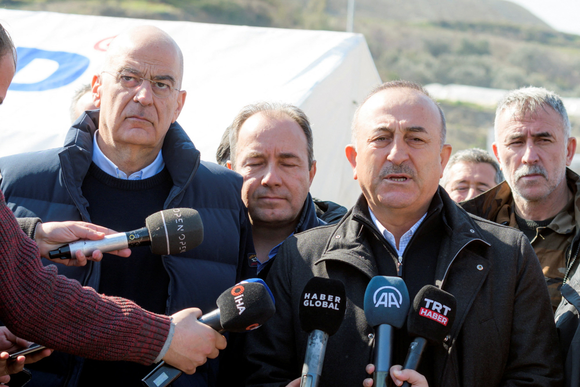 Turkish Foreign Minister Mevlut Cavusoglu speaks to the media, as he and his Greek counterpart Nikos Dendias visit an operations centre, following the deadly earthquake, in Hatay, Turkey, February 12, 2023. Greek Foreign Ministry