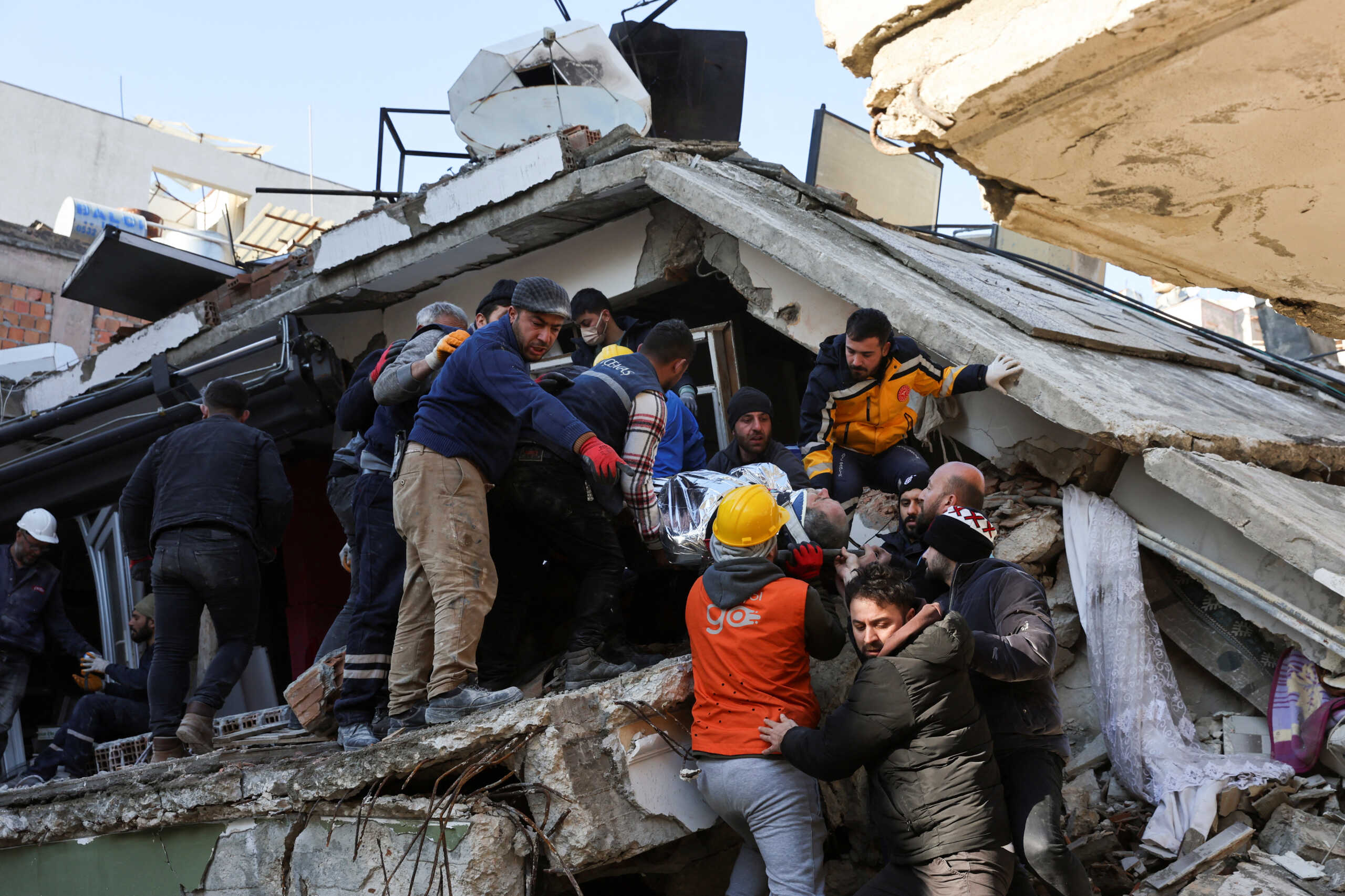 Ilhami Akbulut, 51,  is rescued from a damaged building, as the search for survivors continues, in the aftermath of a deadly earthquake in Hatay, Turkey February 9, 2023. REUTERS
