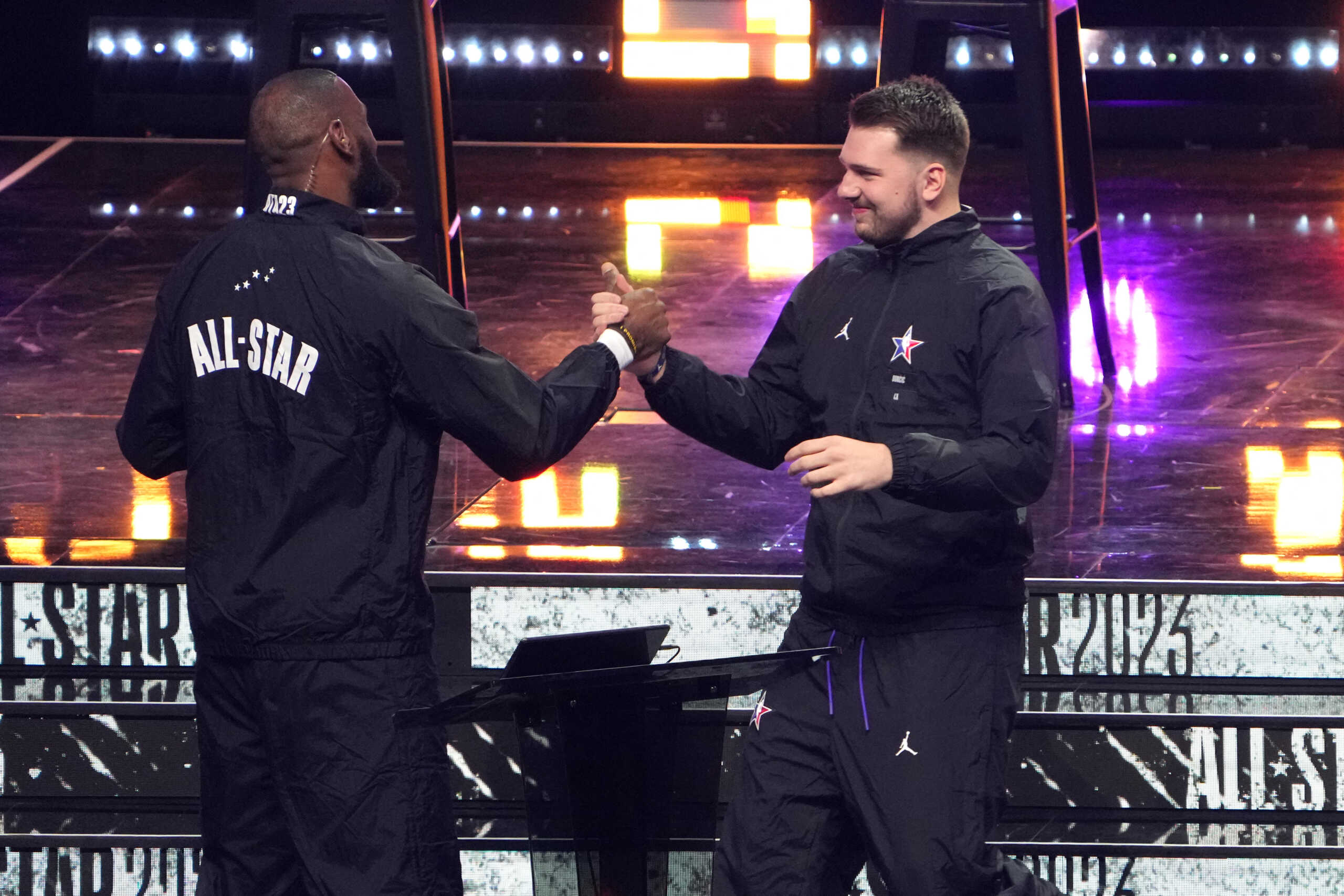 Feb 19, 2023; Salt Lake City, UT, USA; Team LeBron forward Luka Doncic (right) shakes hands with forward LeBron James (6) before the 2023 NBA All-Star Game at Vivint Arena. Mandatory Credit: Kirby Lee-USA TODAY Sports