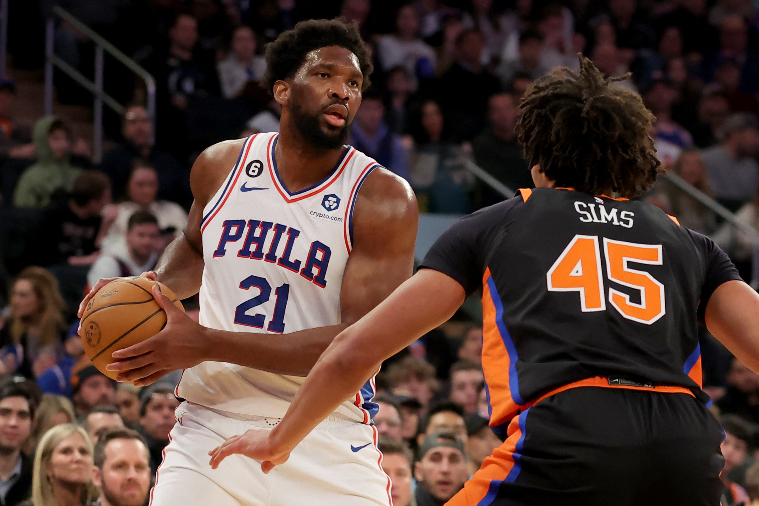 Feb 5, 2023; New York, New York, USA; Philadelphia 76ers center Joel Embiid (21) controls the ball against New York Knicks center Jericho Sims (45) during the first quarter at Madison Square Garden. Mandatory Credit: Brad Penner-USA TODAY Sports