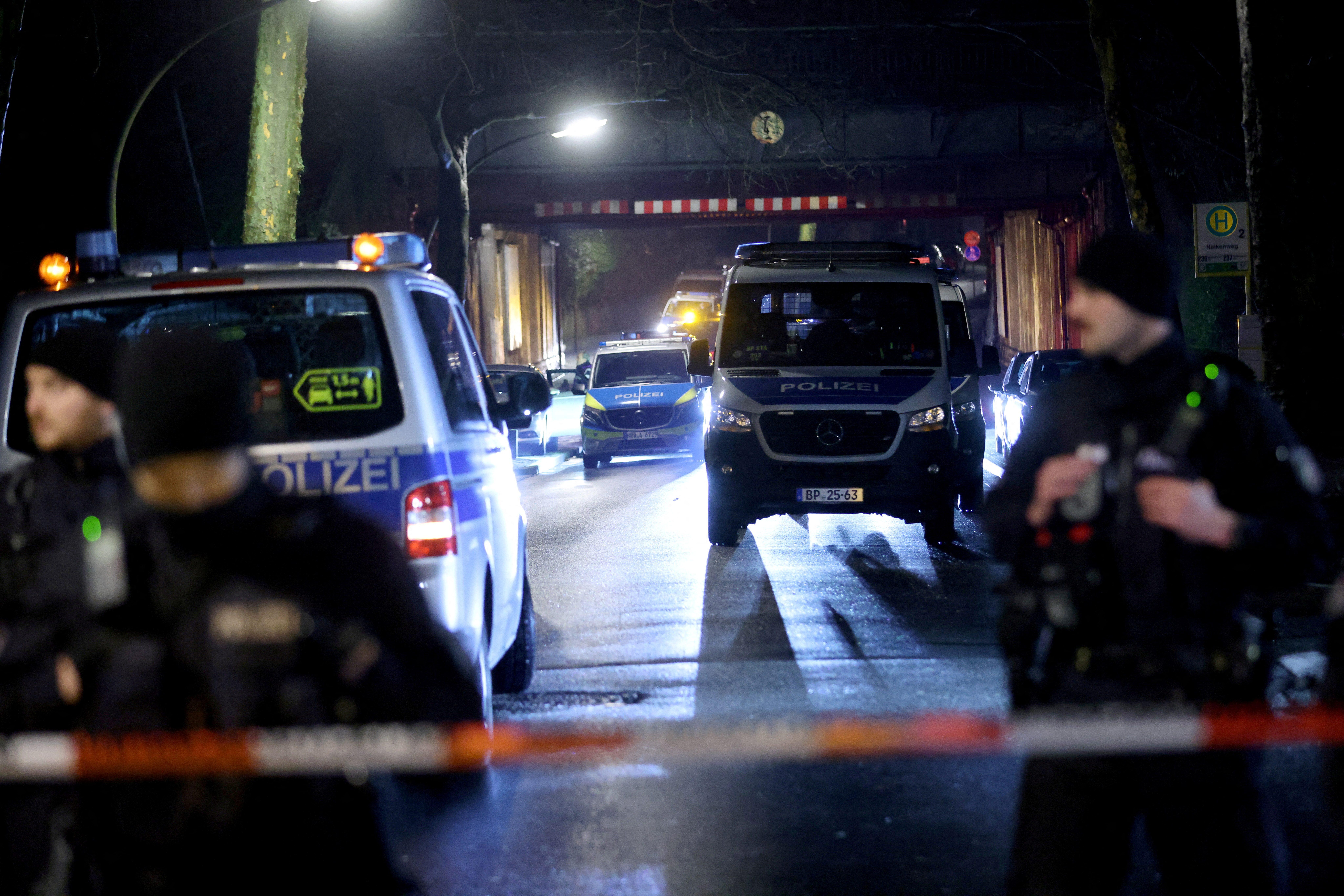 Police officers secure the area near the scene of a train crash in Recklinghausen, Germany, February 2, 2023. REUTERS