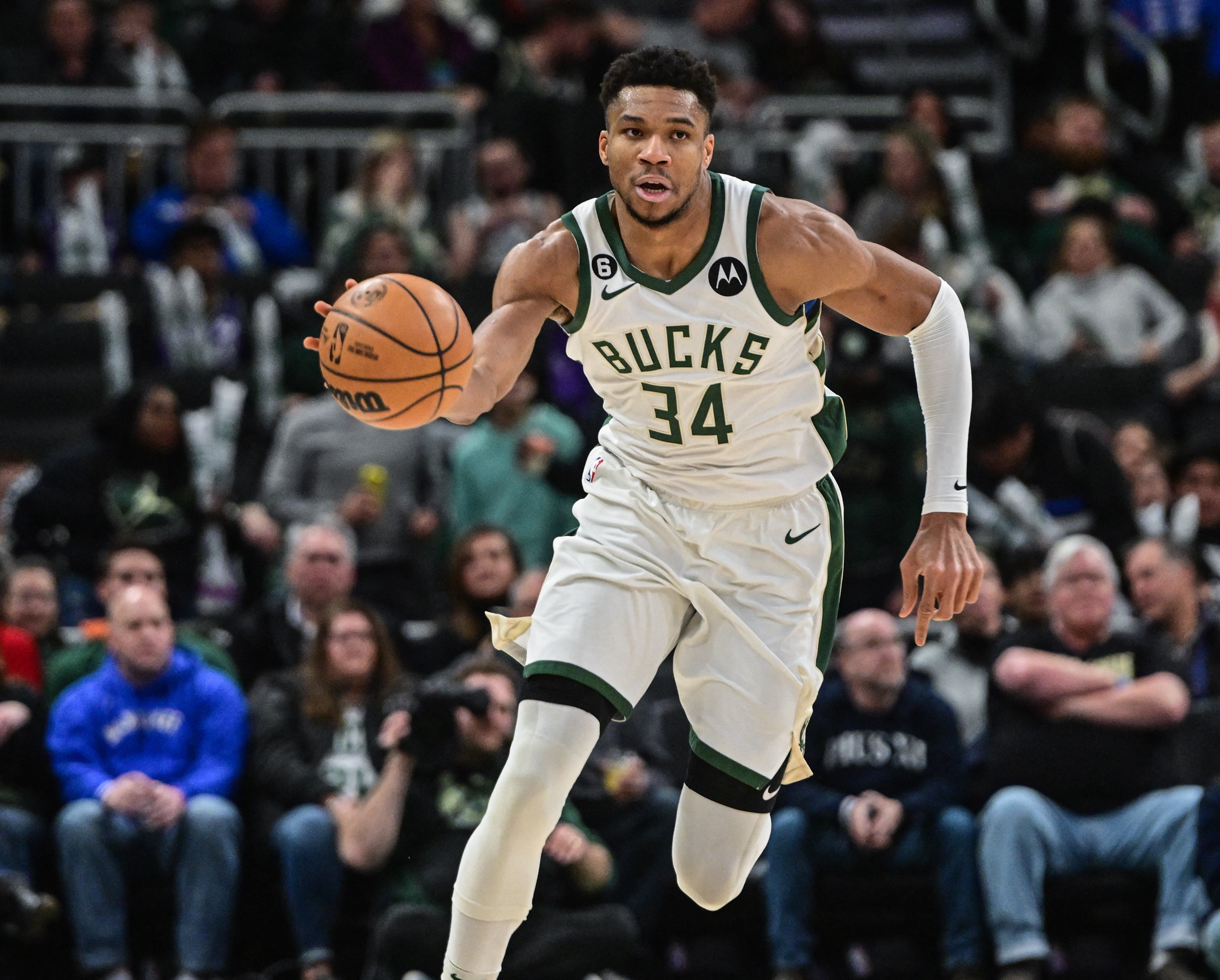 Jan 29, 2023; Milwaukee, Wisconsin, USA; Milwaukee Bucks forward Giannis Antetokounmpo (34) brings the ball downcourt in the third quarter during game against the New Orleans Pelicans at Fiserv Forum. Mandatory Credit: Benny Sieu-USA TODAY Sports