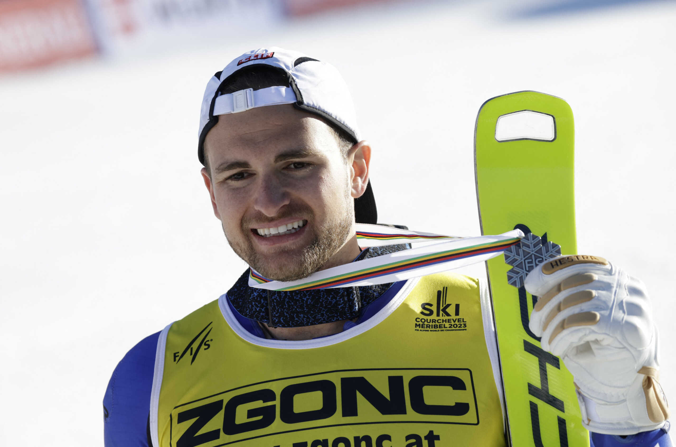 Alpine Skiing - FIS Alpine Ski World Cup - Men's Slalom - Courchevel, France - February 19, 2023 Silver medallist Greece's AJ Ginnis poses with medal after the Men's Slalom REUTERS
