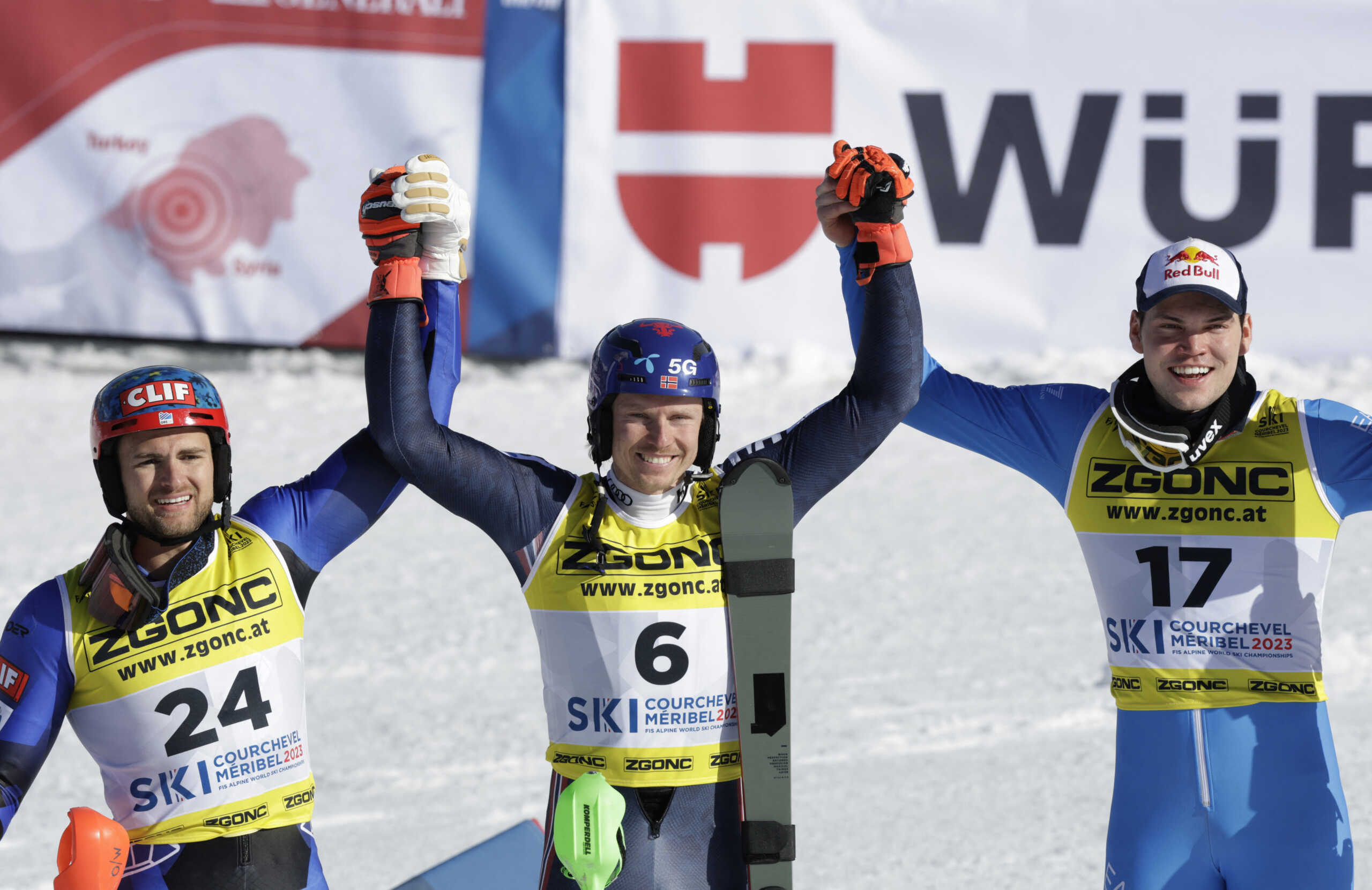 Alpine Skiing - FIS Alpine Ski World Cup - Men's Slalom - Courchevel, France - February 19, 2023 Norway's Henrik Kristoffersen celebrates after winning the Men's Slalom alongside second placed Greece's AJ Ginnis and third placed Italy's Alex Vinatzer REUTERS