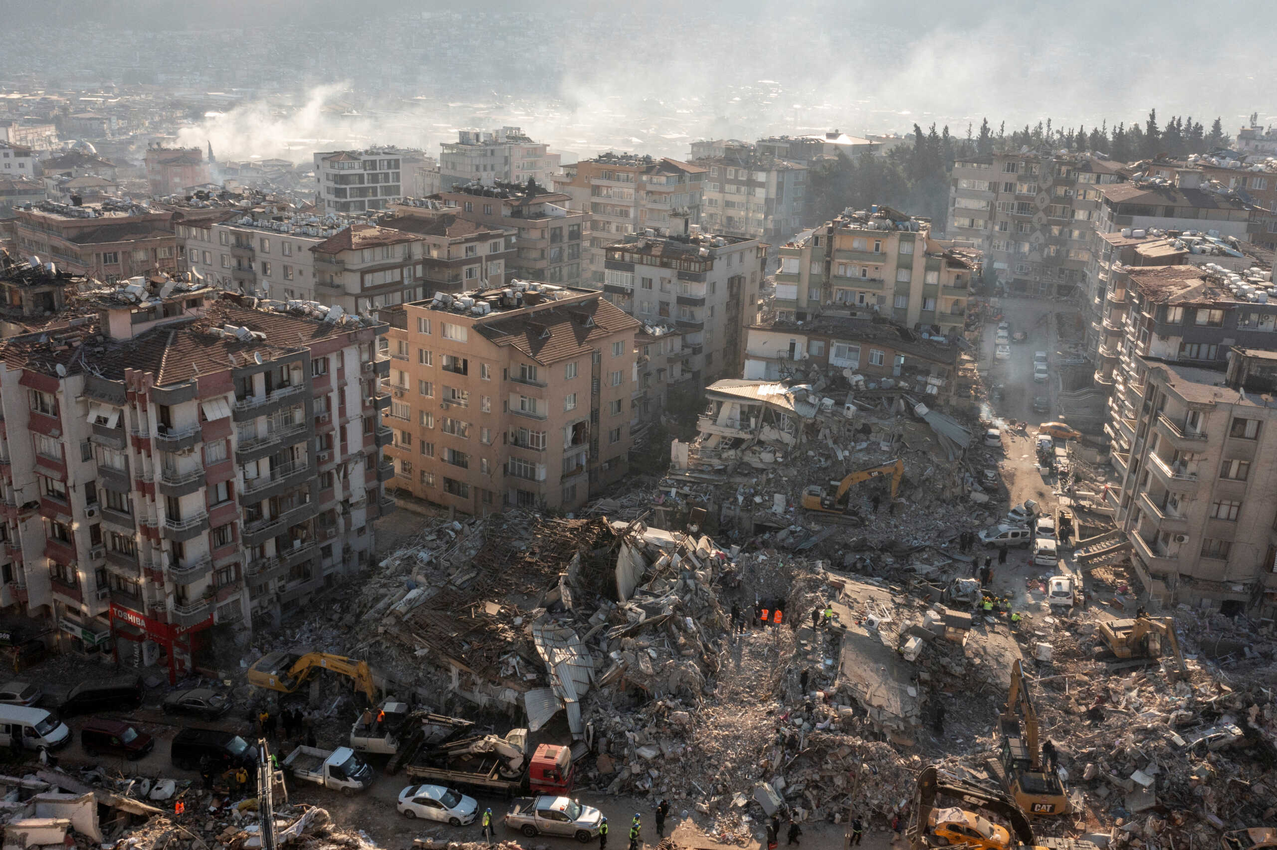 An aerial view shows collapsed and damaged buildings following an earthquake in Hatay, Turkey February 10, 2023. REUTERS