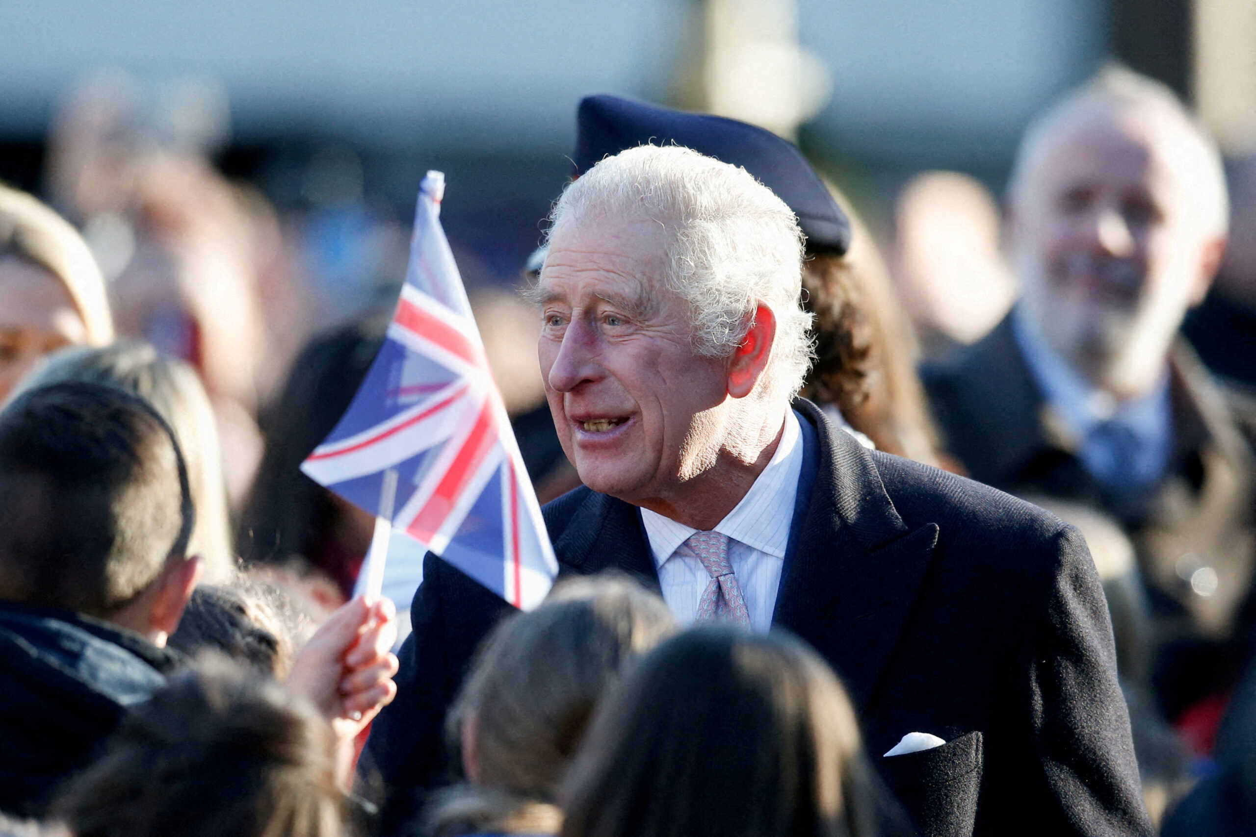 FILE PHOTO: Britain's King Charles greets people as he arrives to visit the Bolton Town Hall, in Bolton, Britain January 20, 2023. REUTERS