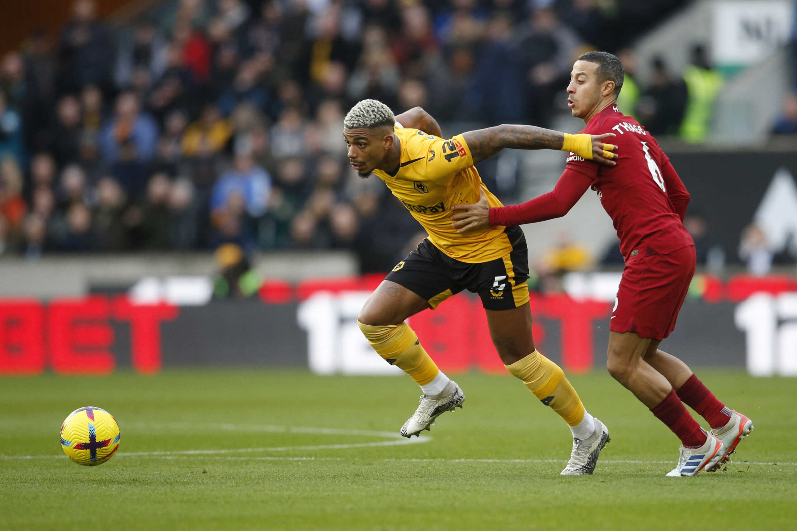 Soccer Football - Premier League - Wolverhampton Wanderers v Liverpool - Molineux Stadium, Wolverhampton, Britain - February 4, 2023 Wolverhampton Wanderers' Mario Lemina in action with Liverpool's Thiago Alcantara Action Images via Reuters