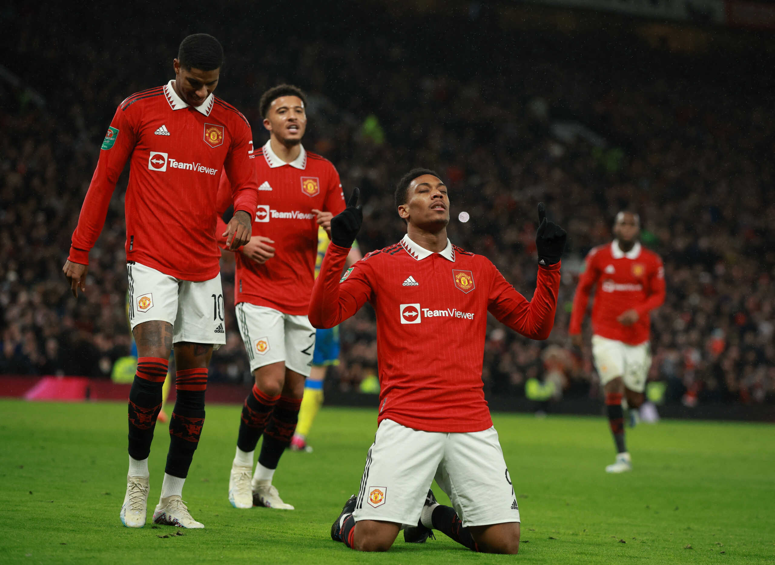 Soccer Football - Carabao Cup - Semi Final - Second Leg - Manchester United v Nottingham Forest - Old Trafford, Manchester, Britain - February 1, 2023 Manchester United's Anthony Martial celebrates scoring their first goal with Marcus Rashford REUTERS