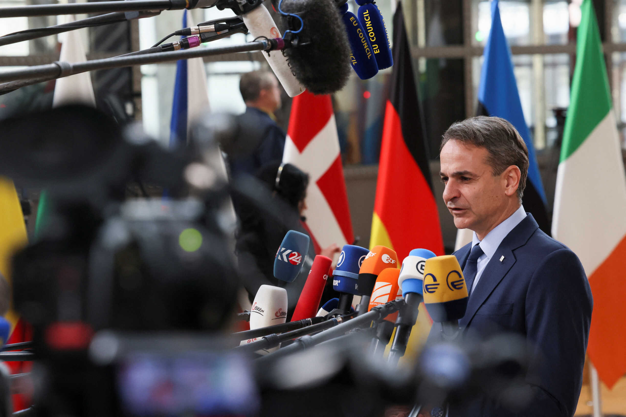Greece's Prime Minister Kyriakos Mitsotakis speaks to the media as he attends the European leaders summit in Brussels, Belgium February 9, 2023. REUTERS