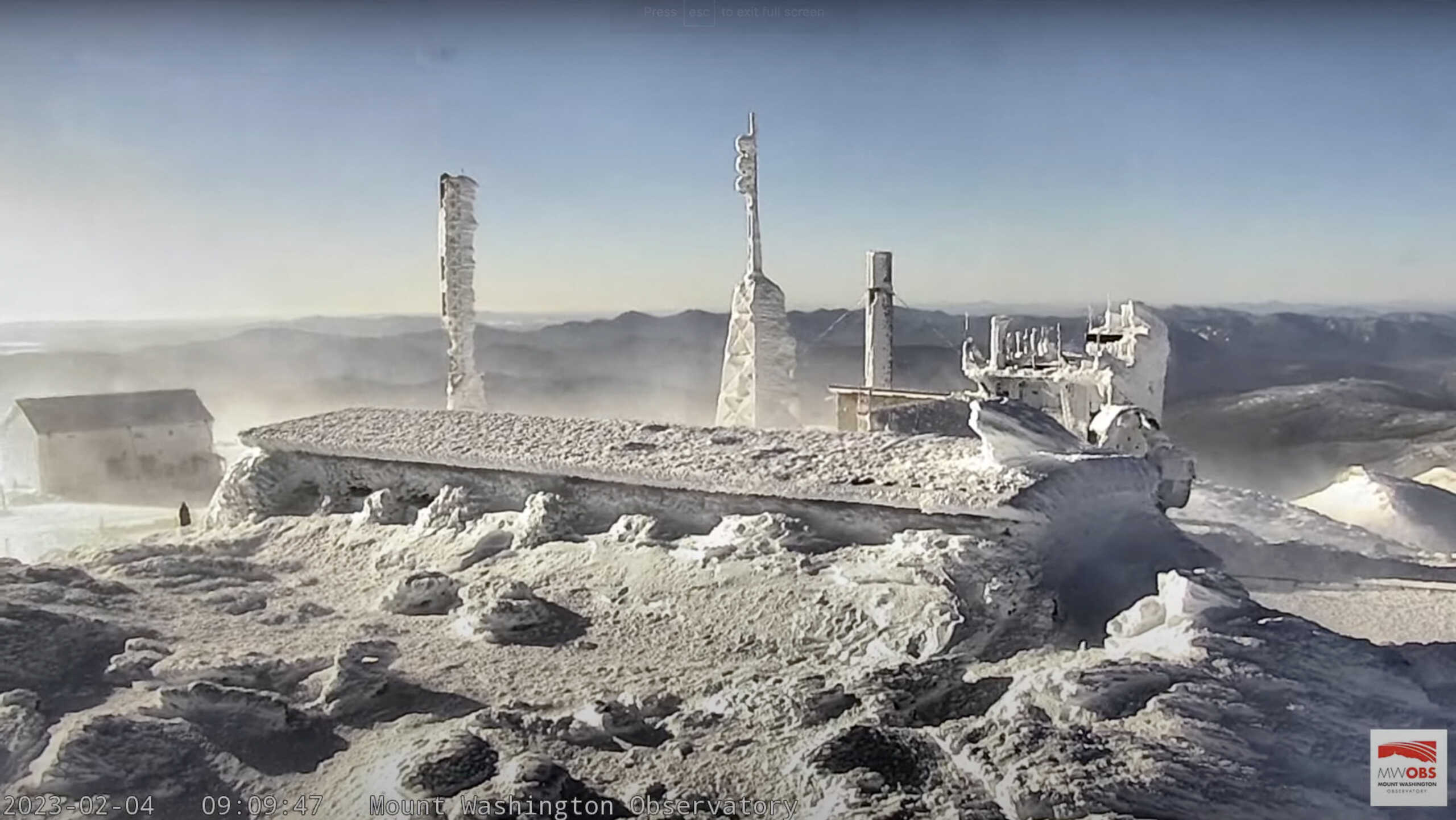A view from the top of the observatory tower at Mount Washington State Park, where the wind chill dropped to 105 degrees below zero Fahrenheit (-79 Celsius) is seen in a still image from a live camera in New Hampshire, U.S. February 4, 2023.  Mount Washington Observatory